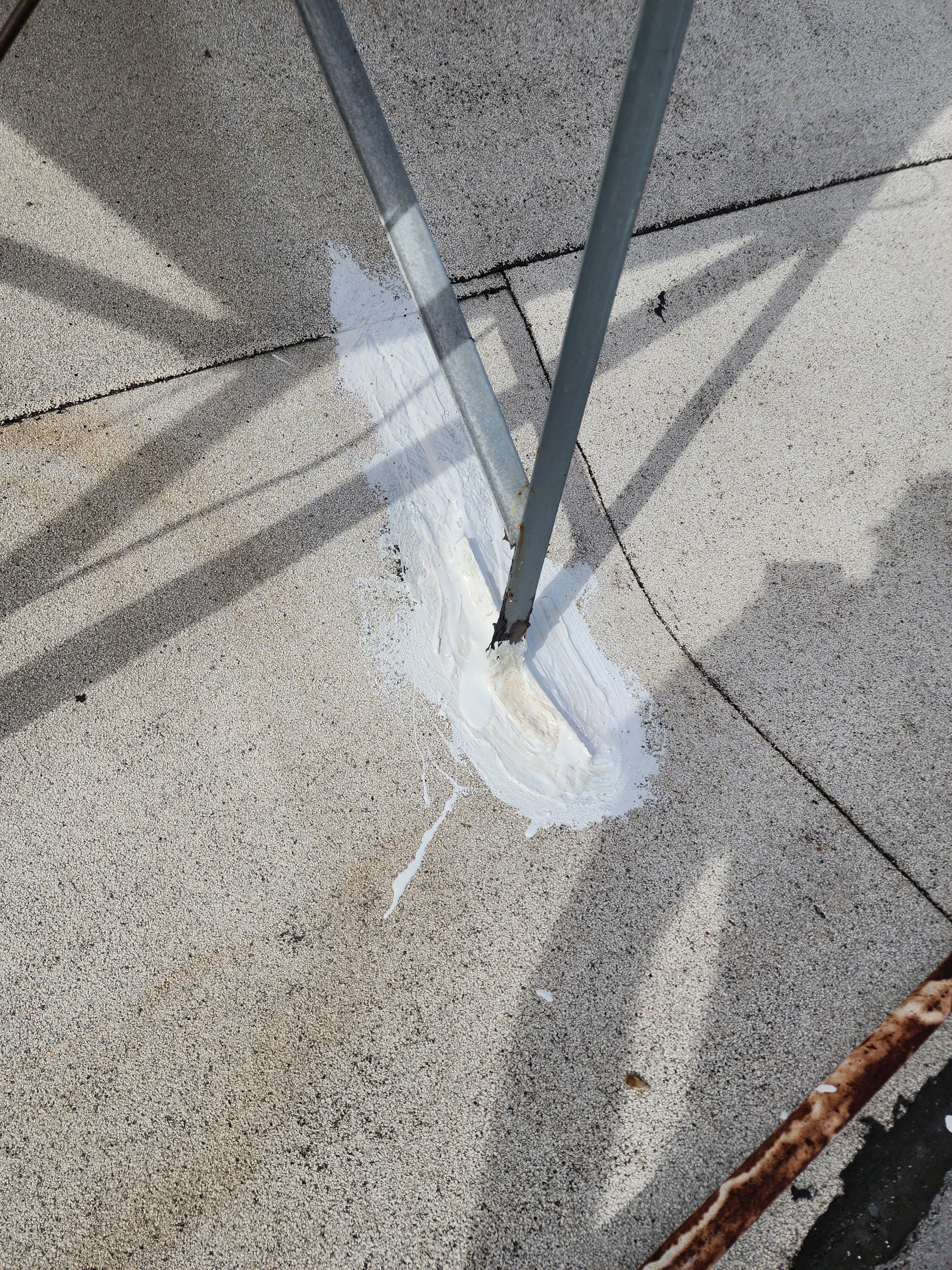 Foam and coatings on commercial roof by Straight Edge Roofing Inc