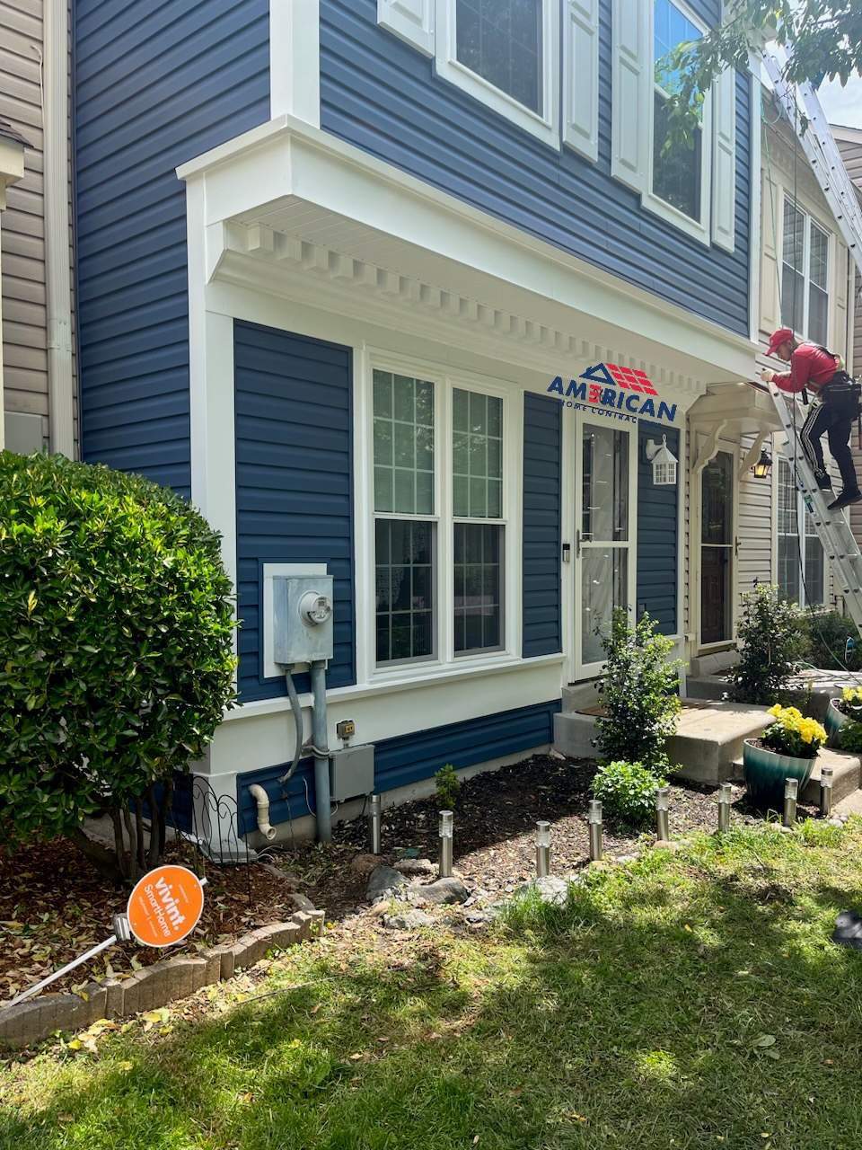 Beautiful in Blue - Mastic Siding Replacement by American Home Contractors