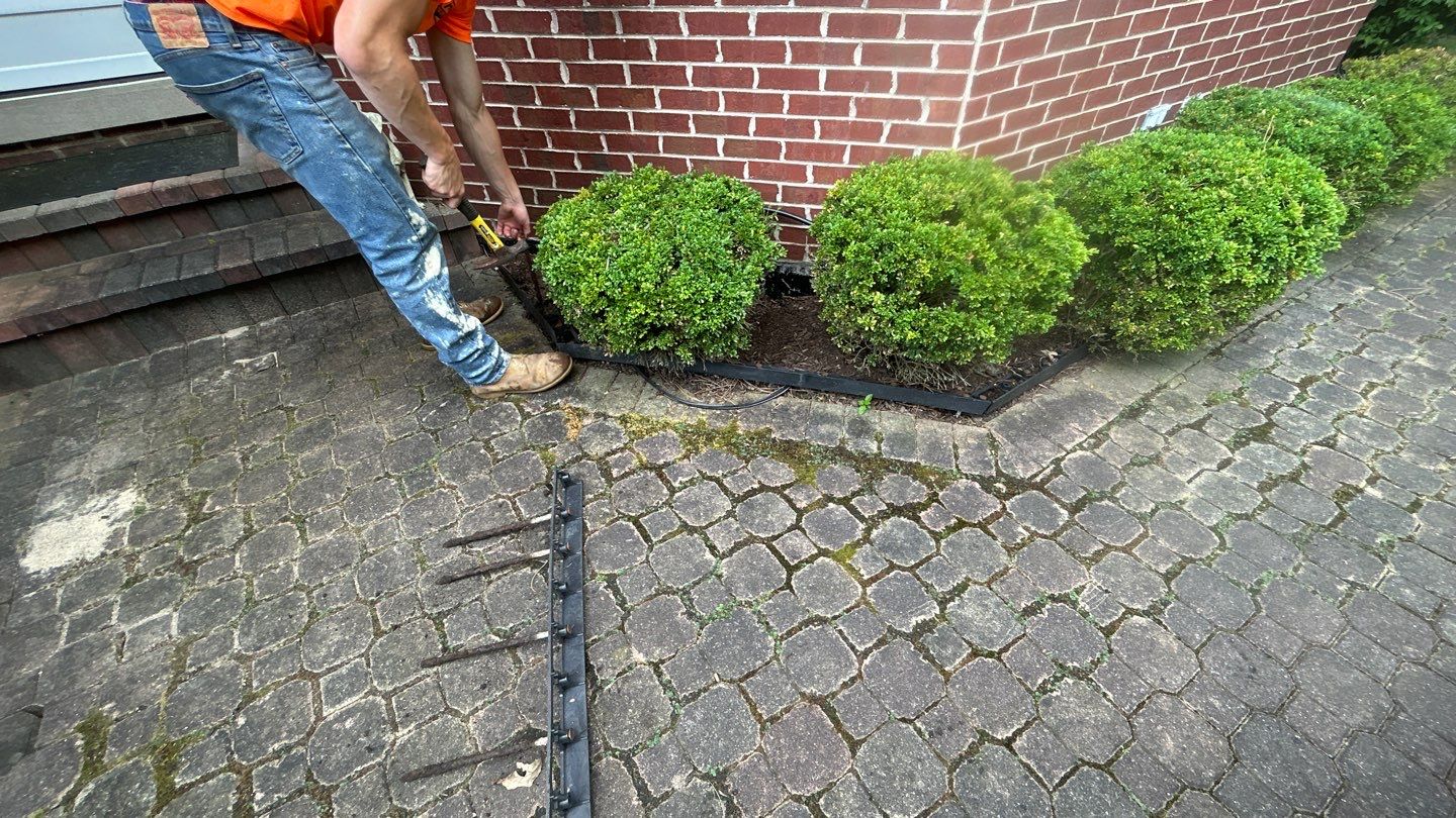 Brick paver repair, clean and seal by Northern Power Washing LLC.