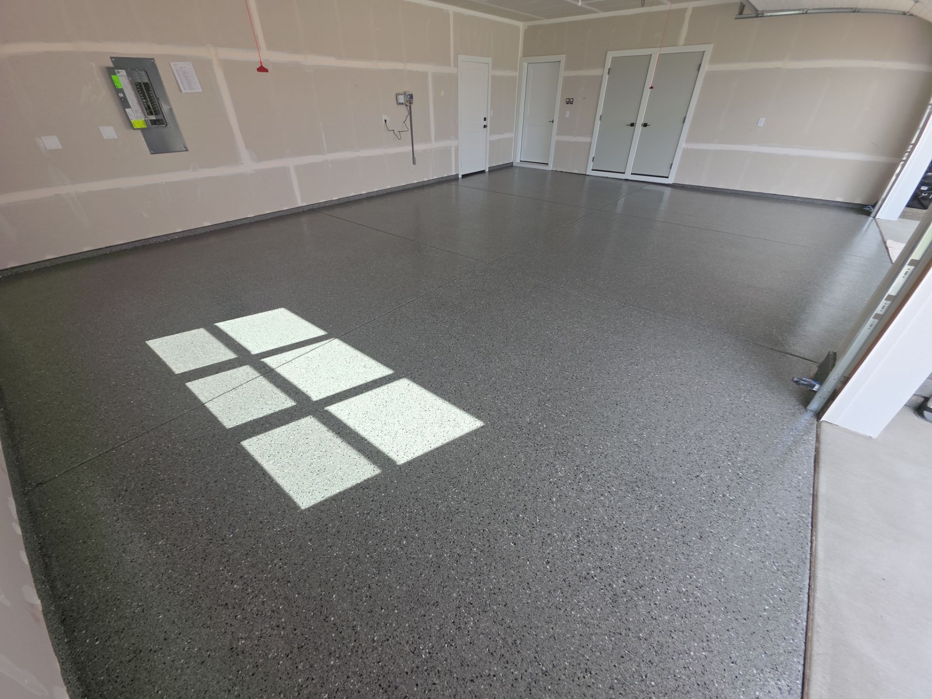 Custom Slate Hybrid Polyaspartic Garage Floor Coating in Coeur d'Alene by Croc Coatings, LLC