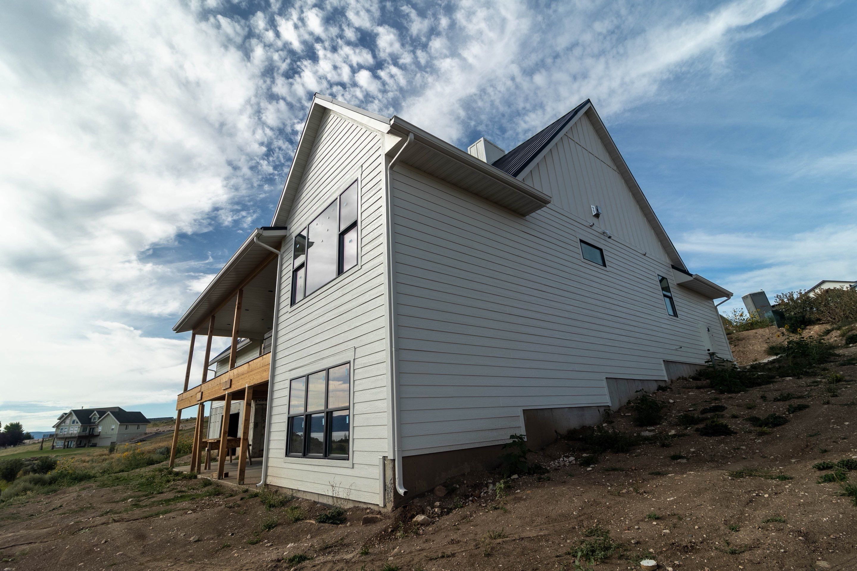LP SmartSide Siding and Metal Roofing Installation in Garden City by Garner Construction