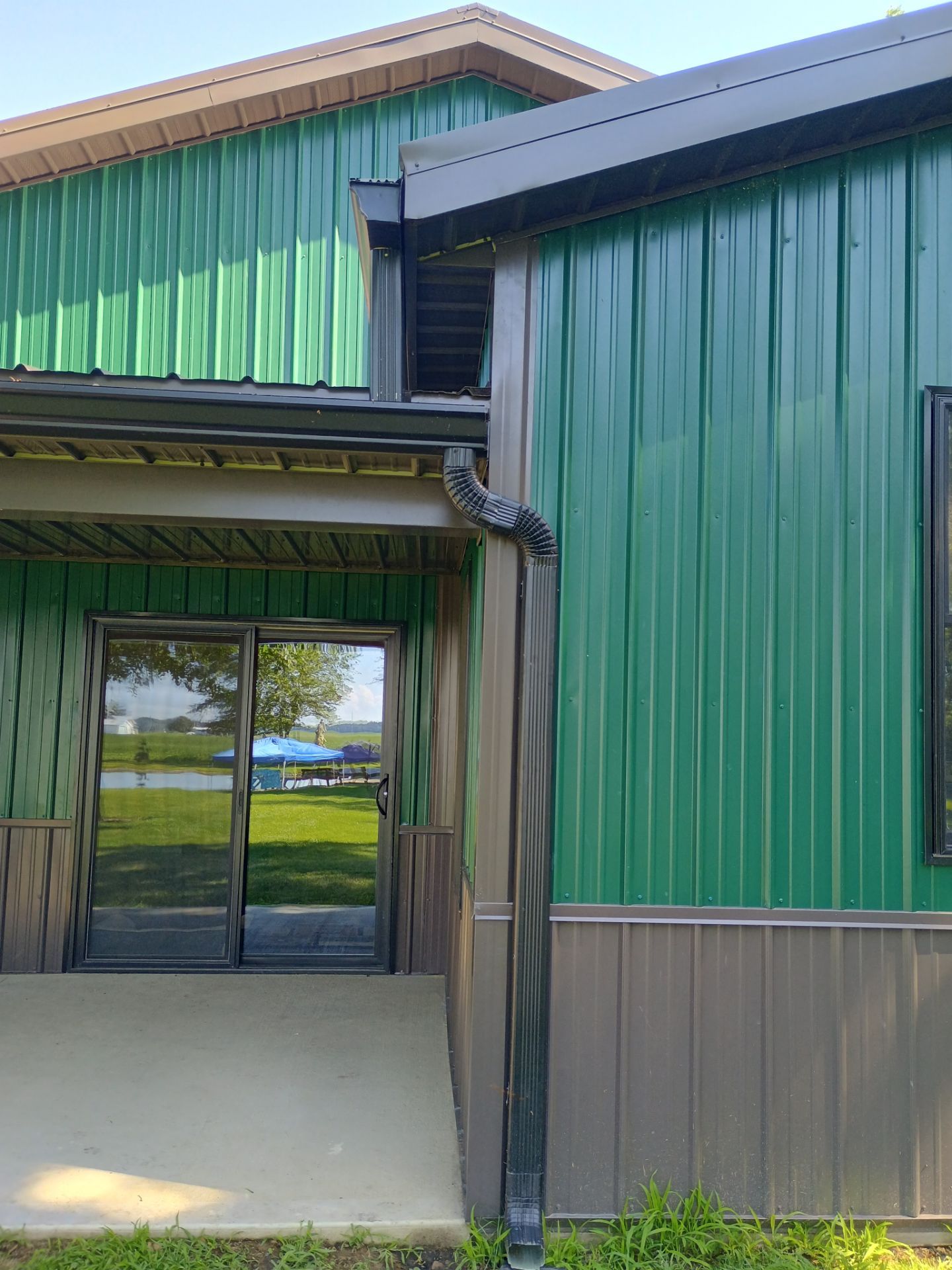 Siding Installation using Platinum AG Panel Burnished Slate  by Nitro Roofing and Construction