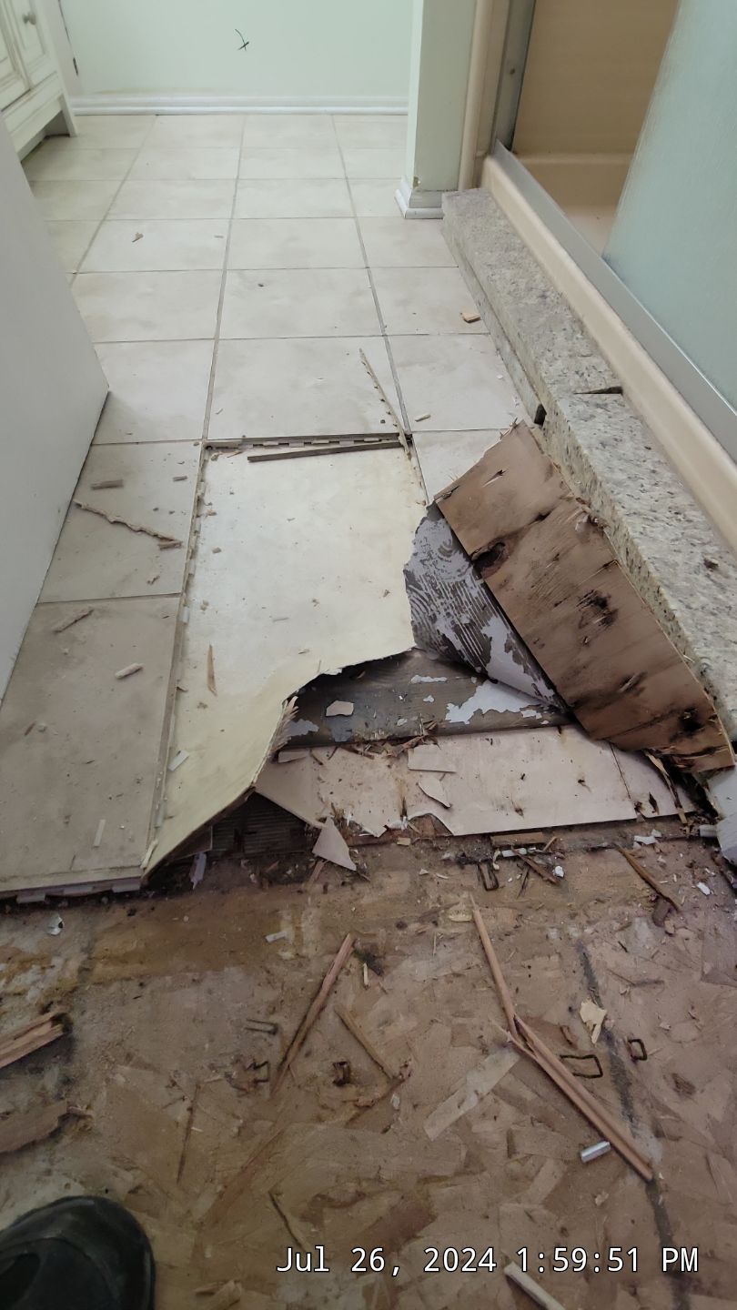Toilet supply line break in 2nd level Master Bathroom by Chicagoland Water Medics