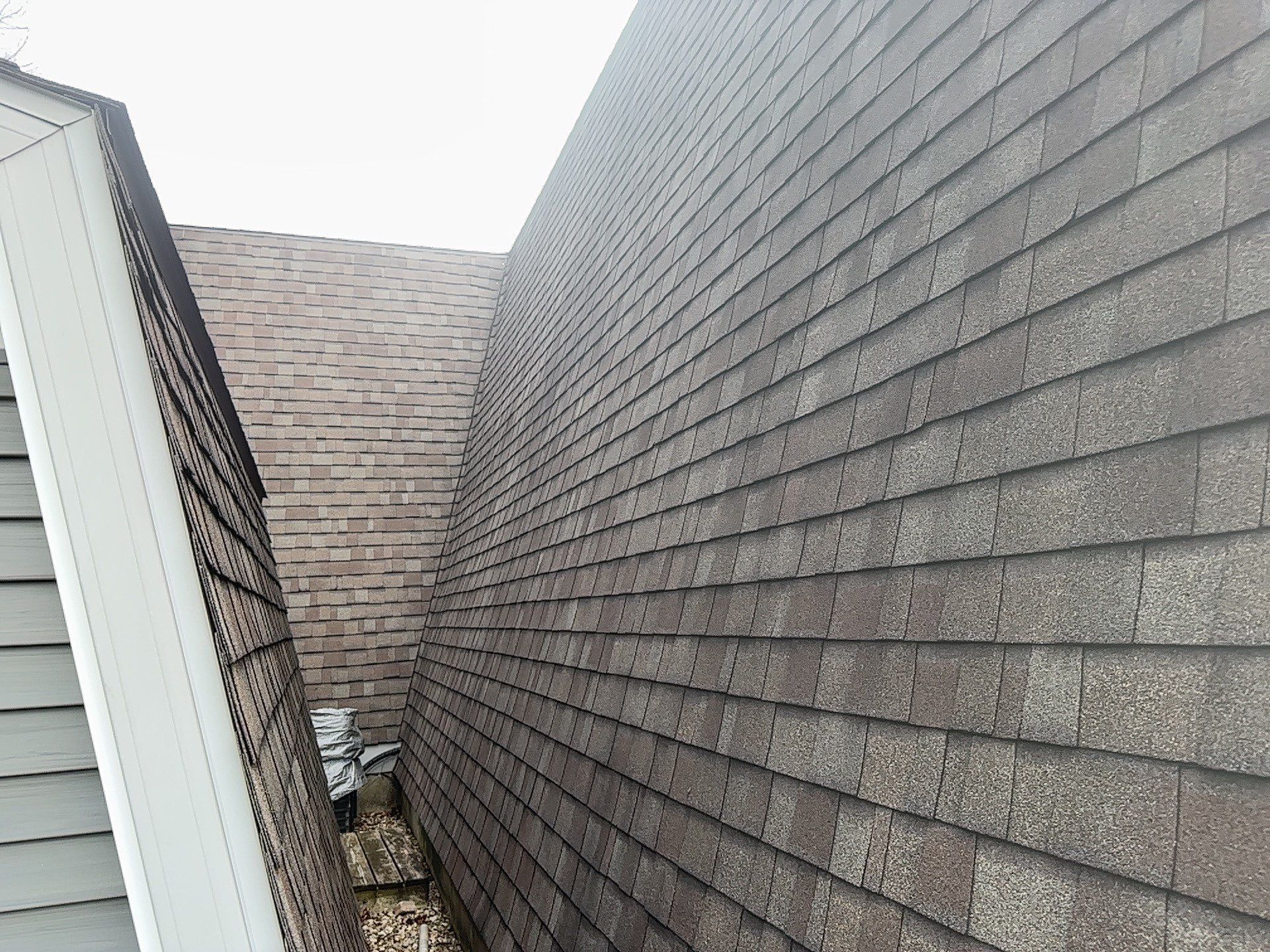 Metal Slate Shingle Roof in Sturgis, Michigan – “Darth Vader Helmet” Home by 4Ever Metal Roofing