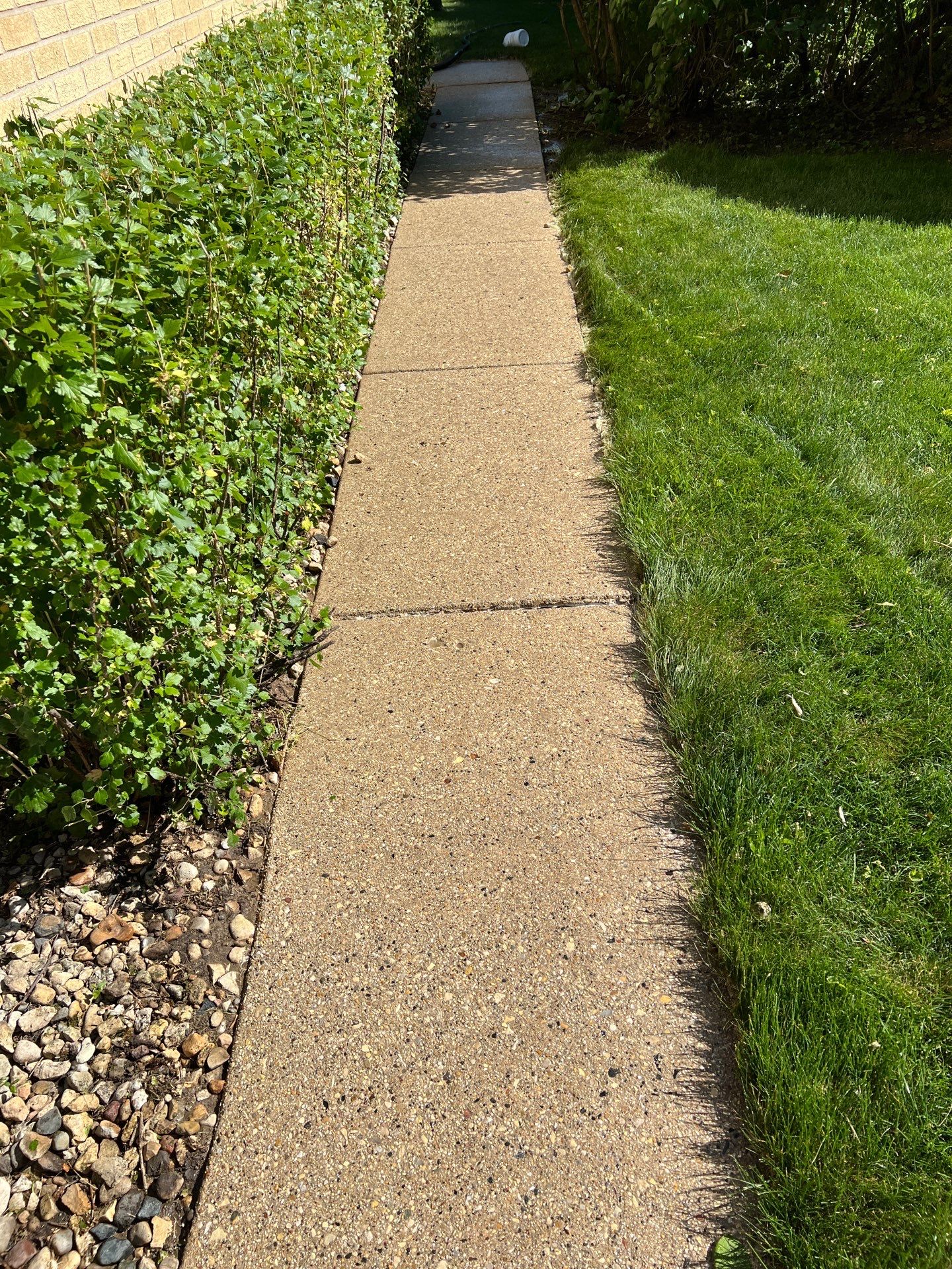 concrete patio power washing  by Northern Power Washing LLC.