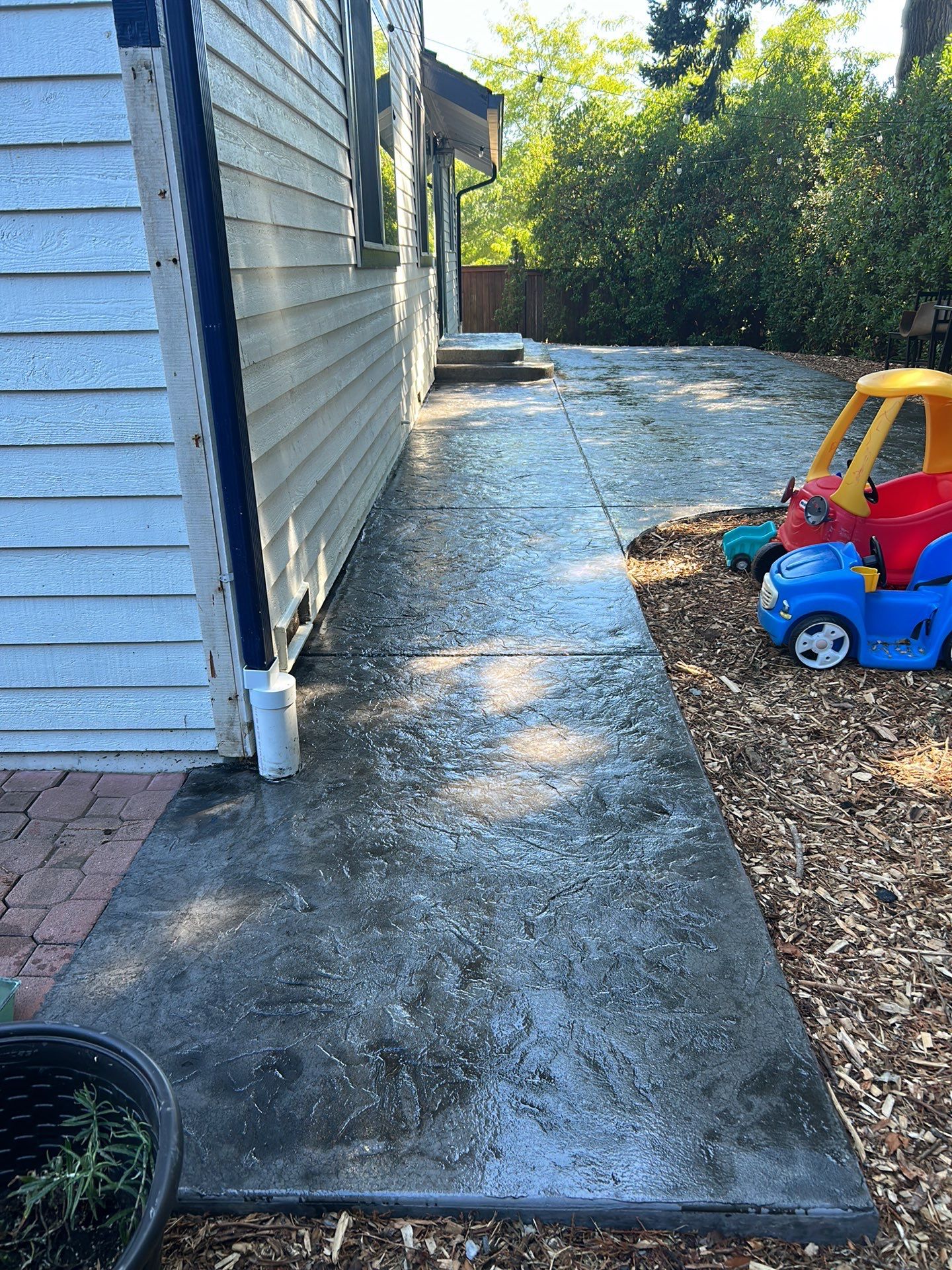 Luo | Colored Stamped Concrete Patio by Jireh Asphalt & Concrete Inc 