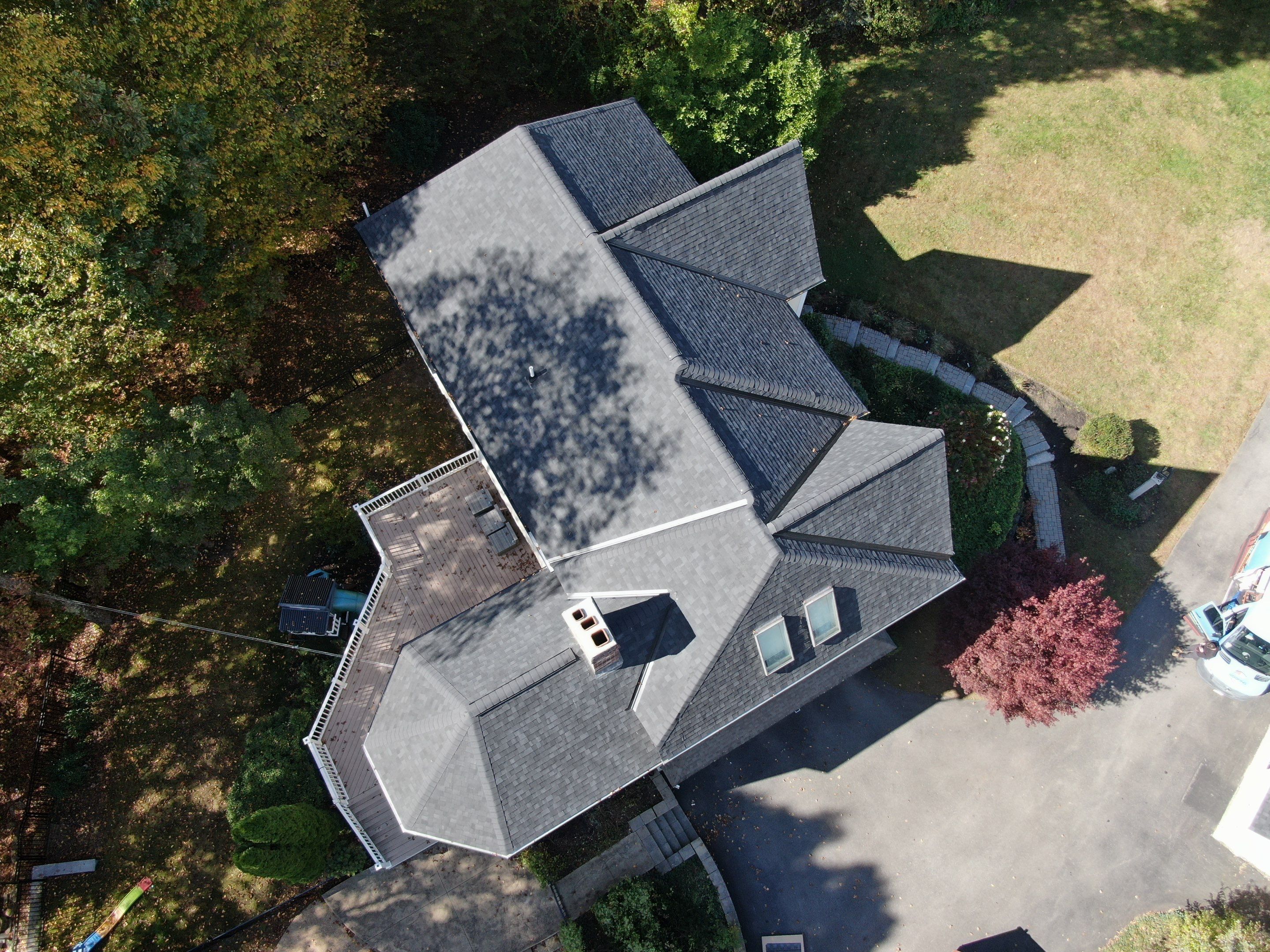 New Roof, Skylights, and Metal Accent Roof Installation in Groton by Mighty Dog Roofing of Greater Middlesex County