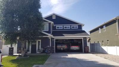 Wind Damage Restoration – Full Roof & Gutter Replacement