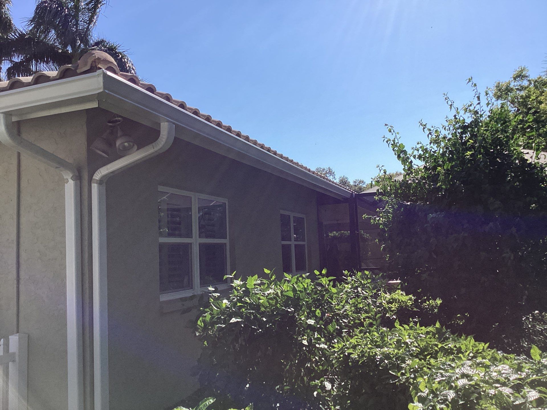 White Gutter Installation in Sarasota FL by Gutter Professors