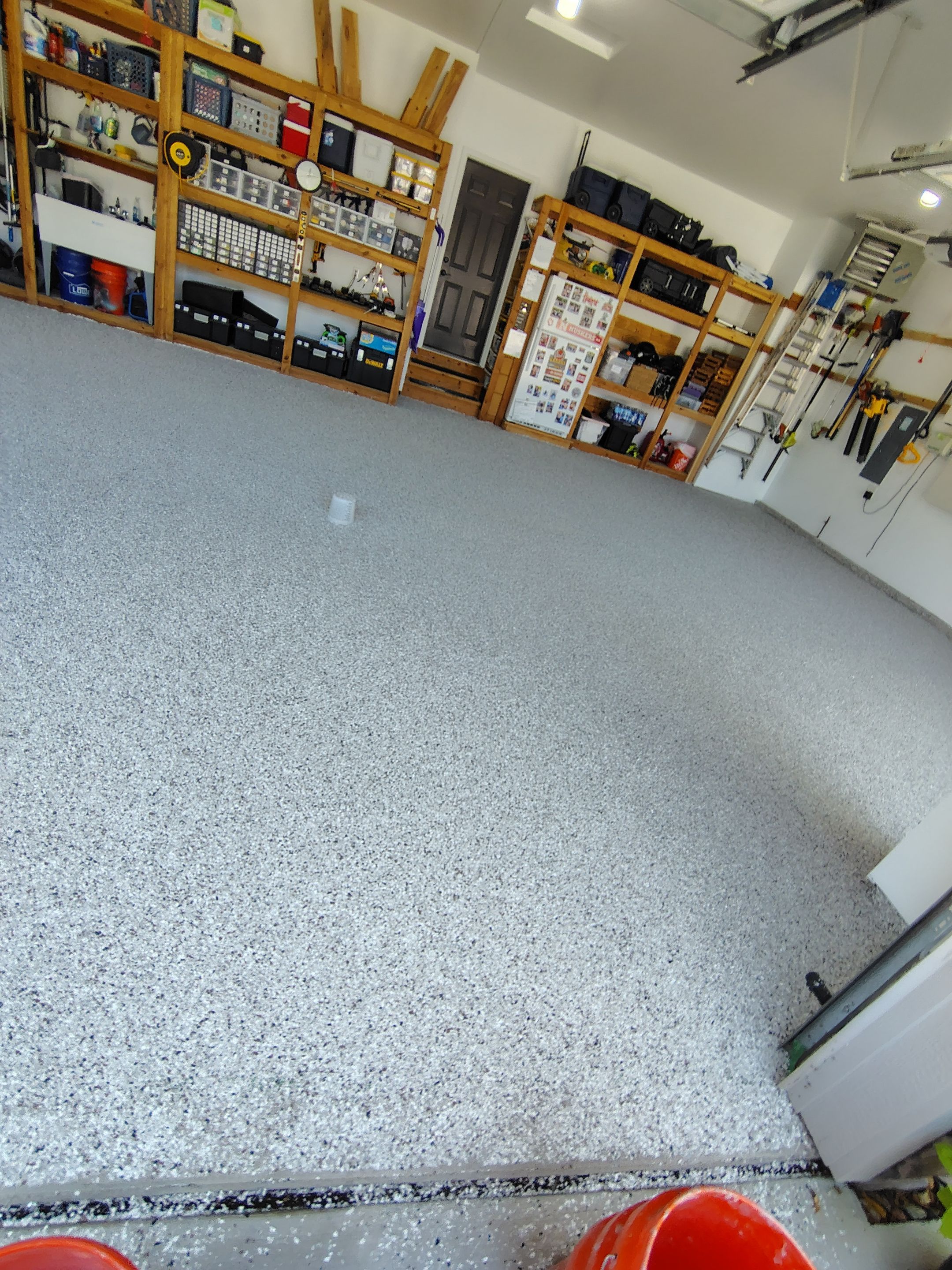 Coyote Garage Floor Coating in Sioux Falls by Select Painting, Coatings & Garage Cabinets