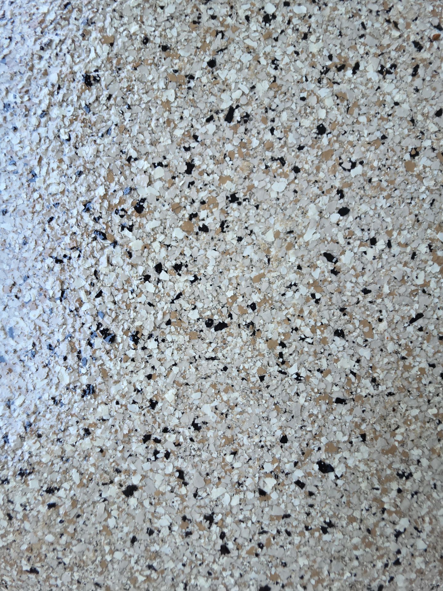 Garage Floor Transformation with Driftwood Flake Coating in Coeur d'Alene by Croc Coatings, LLC