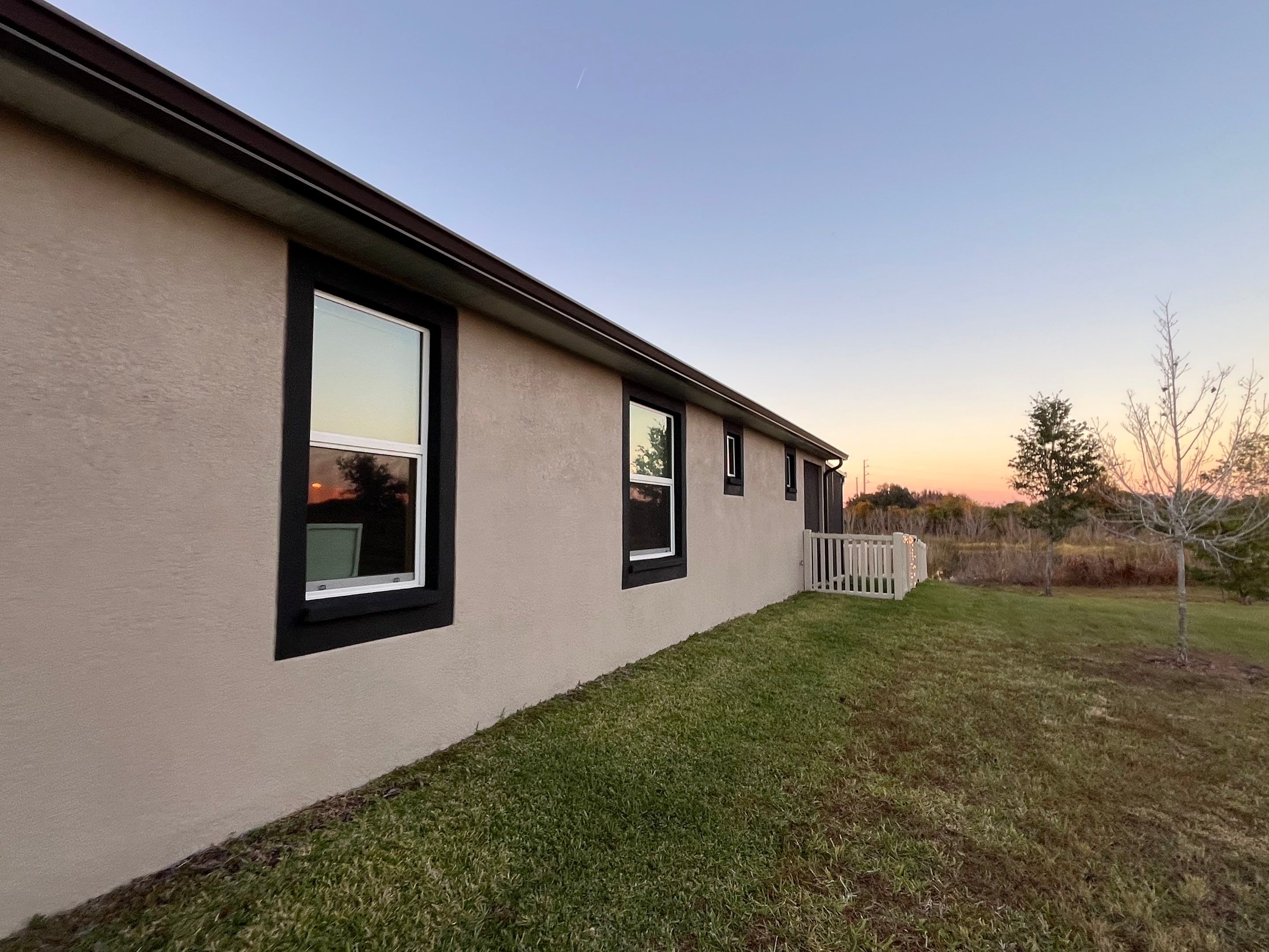 3X4 elbow Downspouts using Musket Brown Seamless Gutters in Lakeland FL by Gutter Professors
