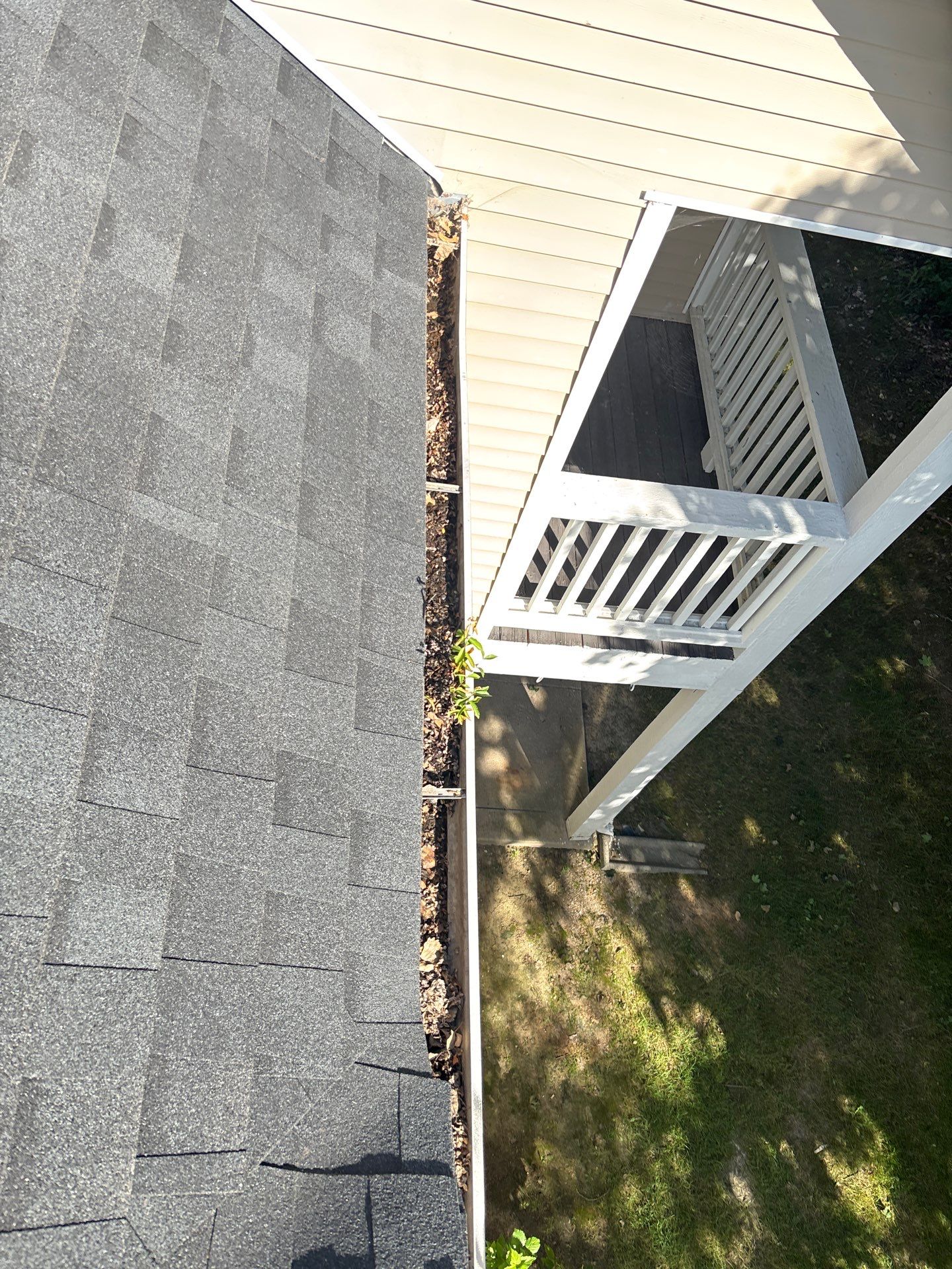 Commercial gutter cleaning Cedar Rapids before photo with filled gutters