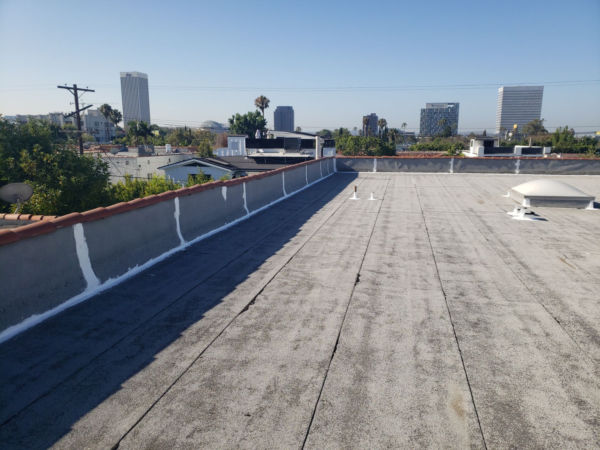 Commercial Roofing Installation using Silicone Coating by Hull Brothers Roofing