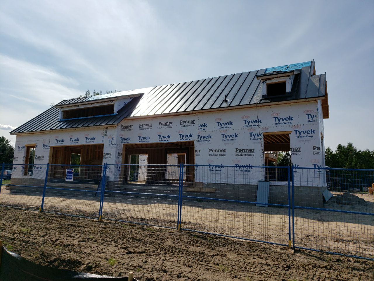 New Home Construction using 16" Standing Seam Panels by Jay Carter Roofing & Sheet Metal