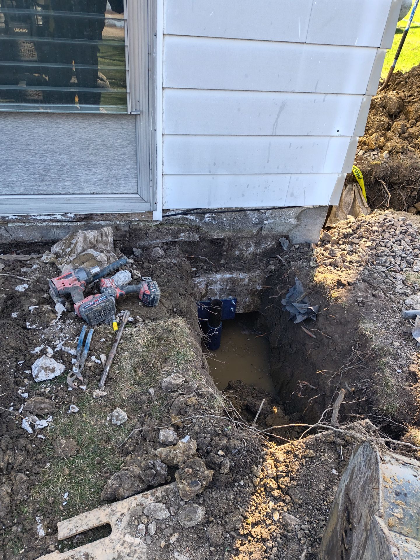 Helical Piers & Parge Coating by Toledo Basement Repair 