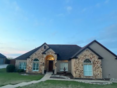 Cream brick/mixed stone with IKO Shadow Brown