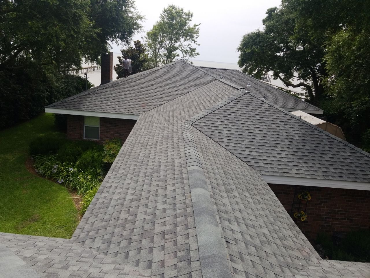 Residential Roofing Installation using Roof Replacement by American Roofing & Construction LLC