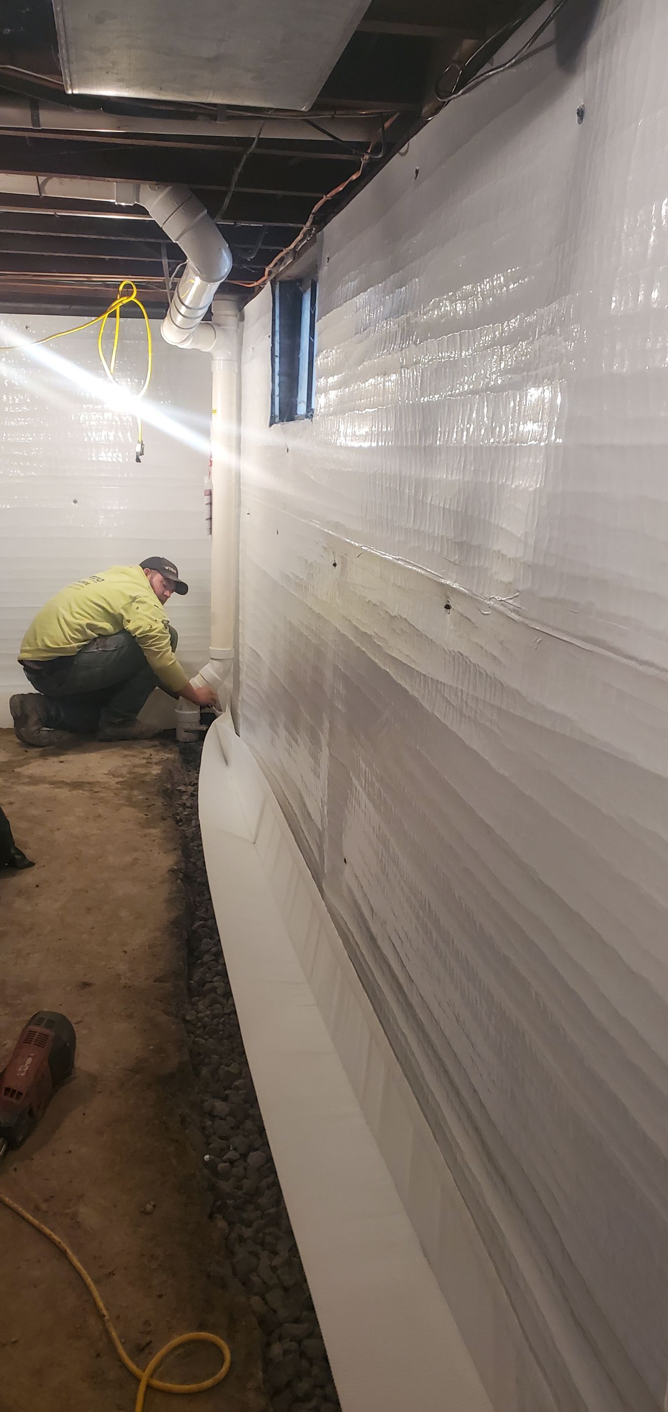 Interior Basement Waterproofing System using GrateDrain Waterproofing System by Toledo Basement Repair 