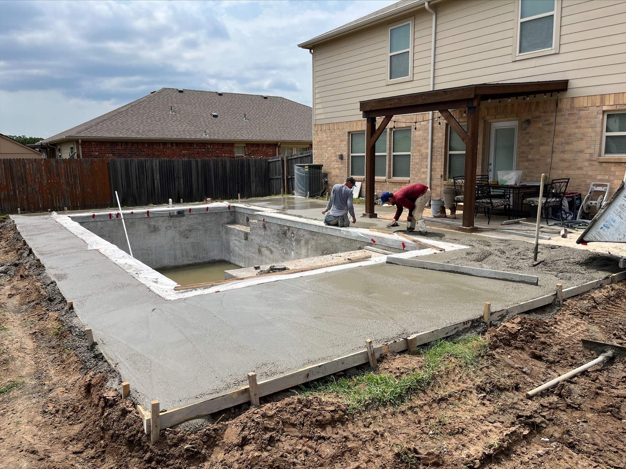 Geometric Pool with Tanning Ledge by Pinnacle Pools and Spas - DFW