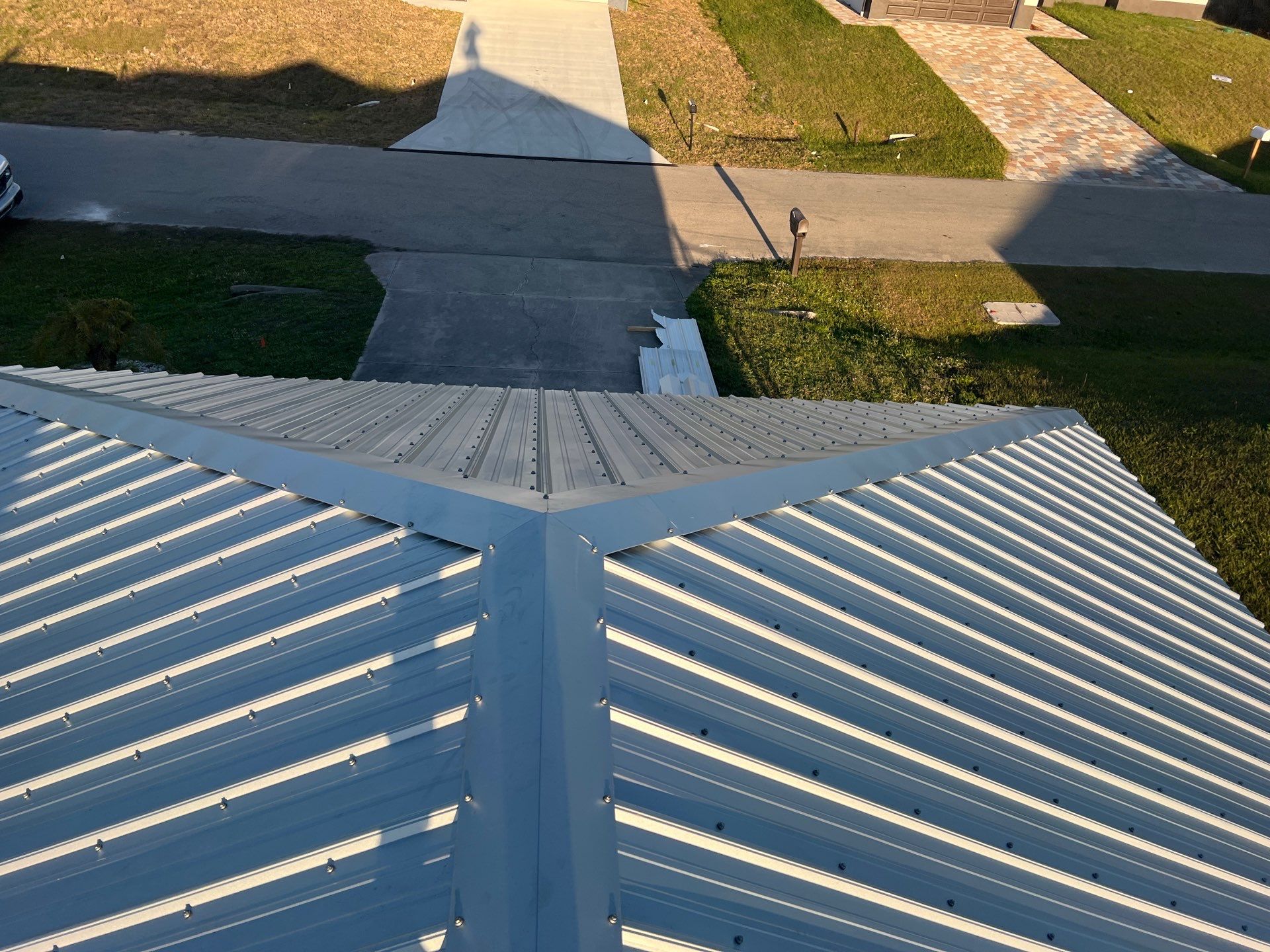 Residential Roofing Installation using Durabull Classic Rib Panel by Durabilis Roofing INC