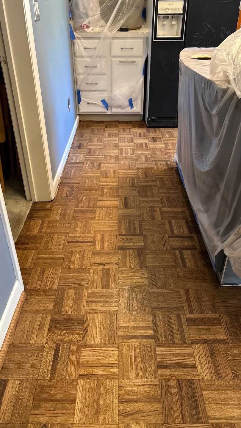 Parquet floor and stair treads by Footprints Floors of Nashville