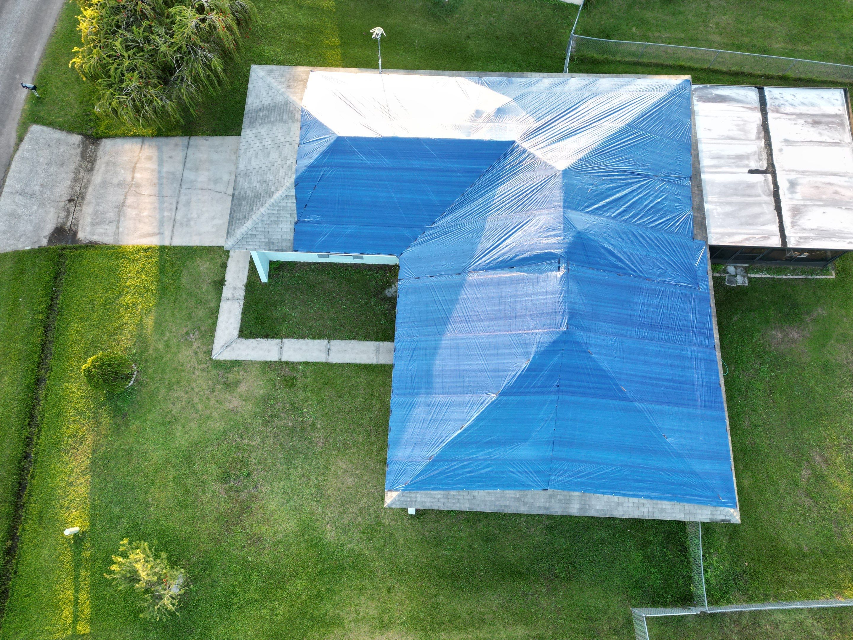 Tarp using TARP BLUE by AquaShield Restoration USA