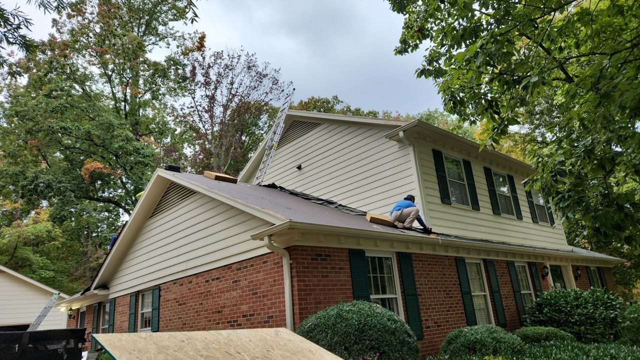 New Roof with Solar Panels by Just In Time Roofing and Restoration