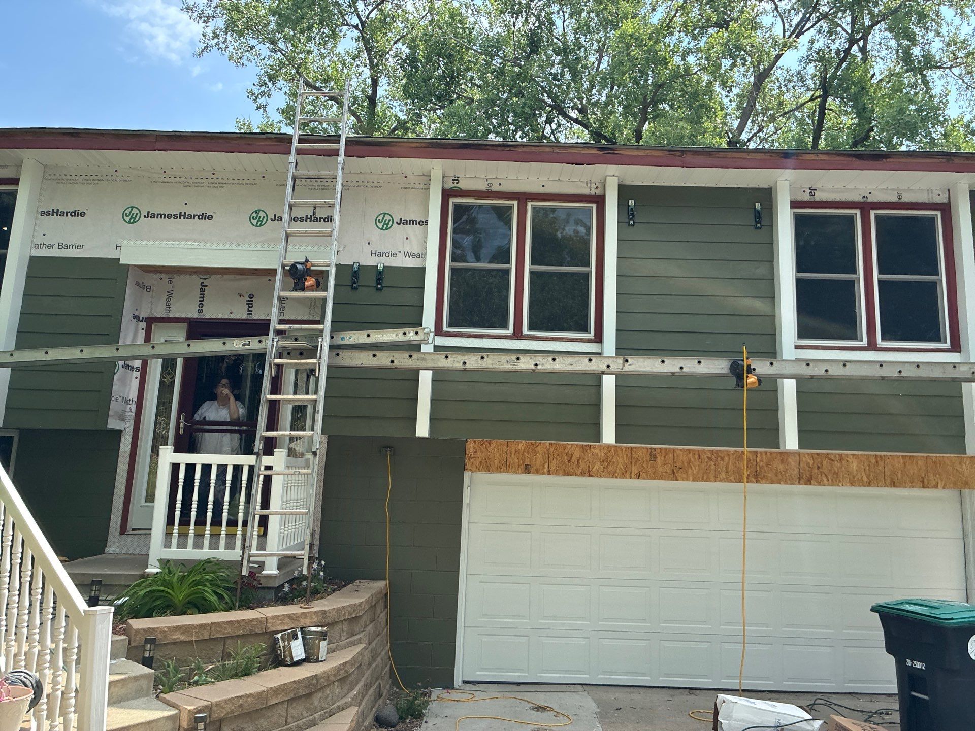 James Hardie Siding Replacement in Omaha with Mountain Sage Finish by Carps Complete Exteriors