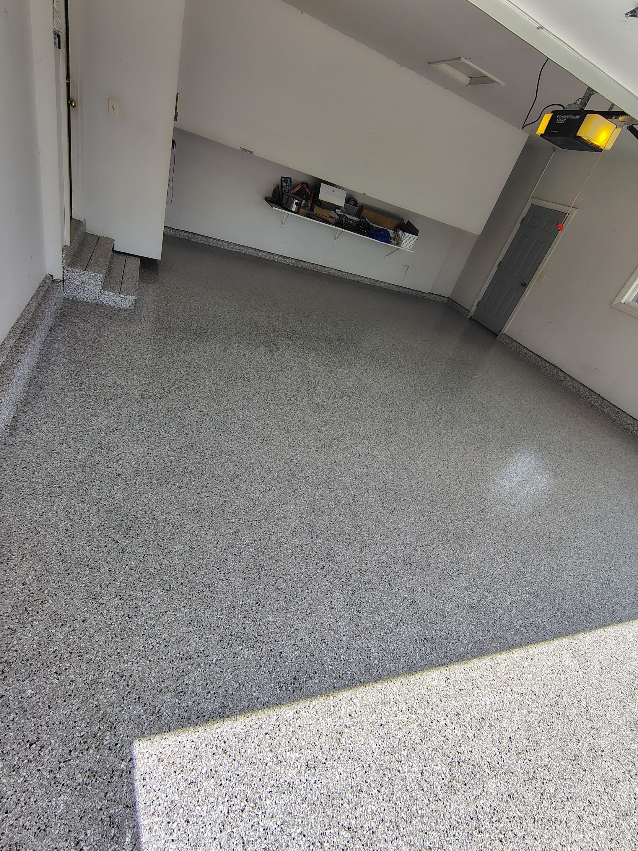 Decorative Chip Epoxy Garage Floor Coating in Sioux Falls by Select Painting, Coatings & Garage Cabinets