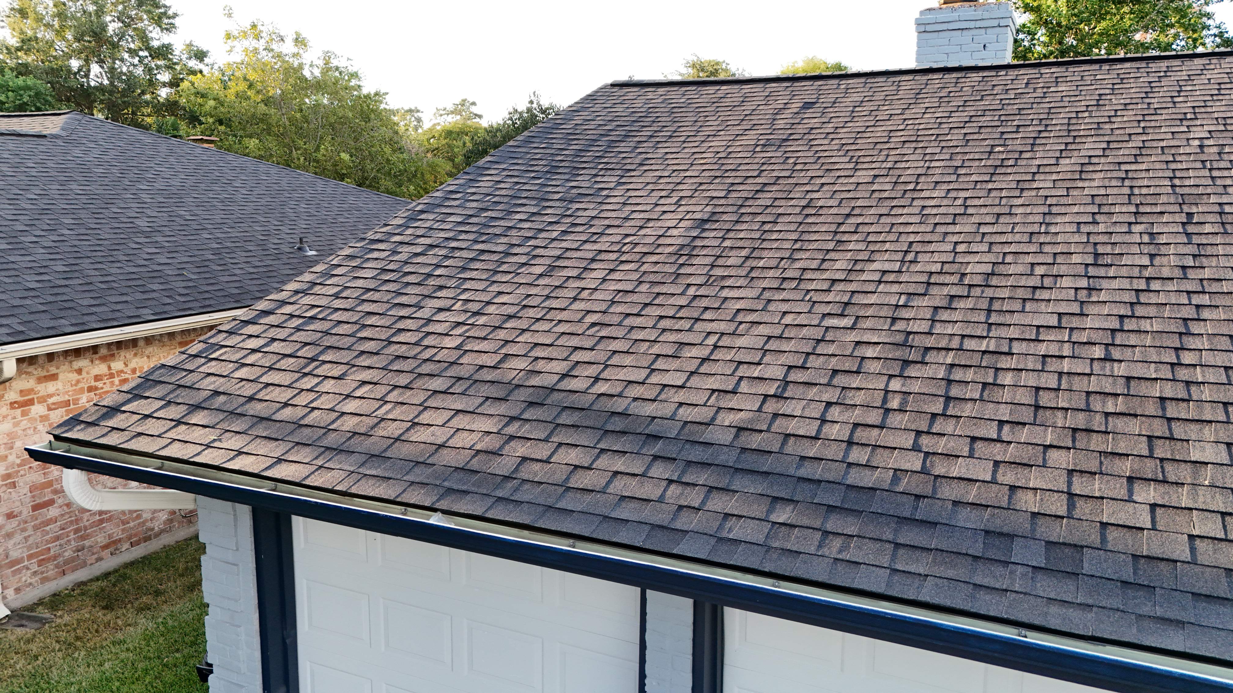 Poolside Roof Replacement in Smoky Gray — Houston, TX by PL Roofing & SB Roofing, LLC.