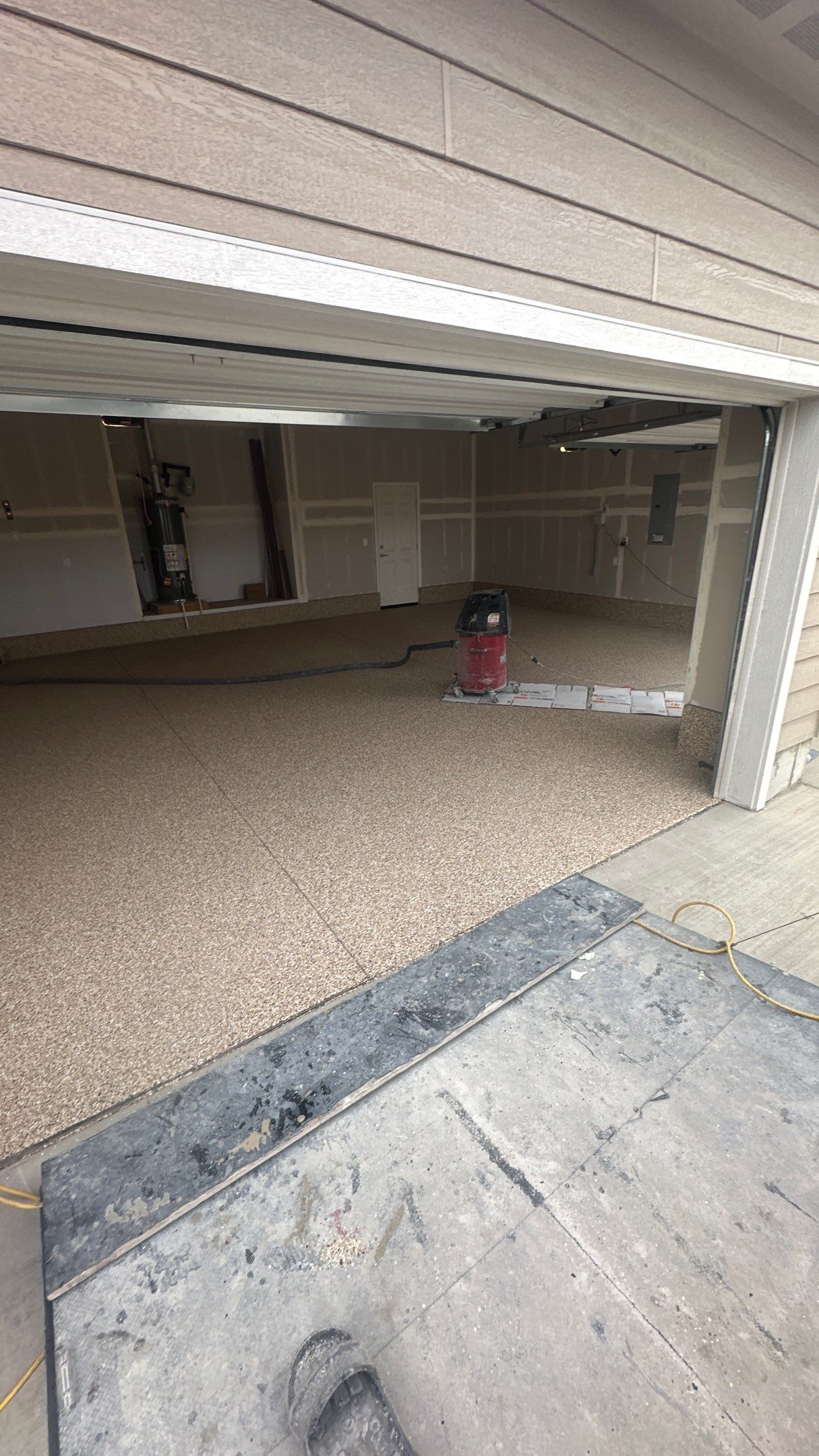 Garage Transformation using Sandstone by Croc Coatings, LLC