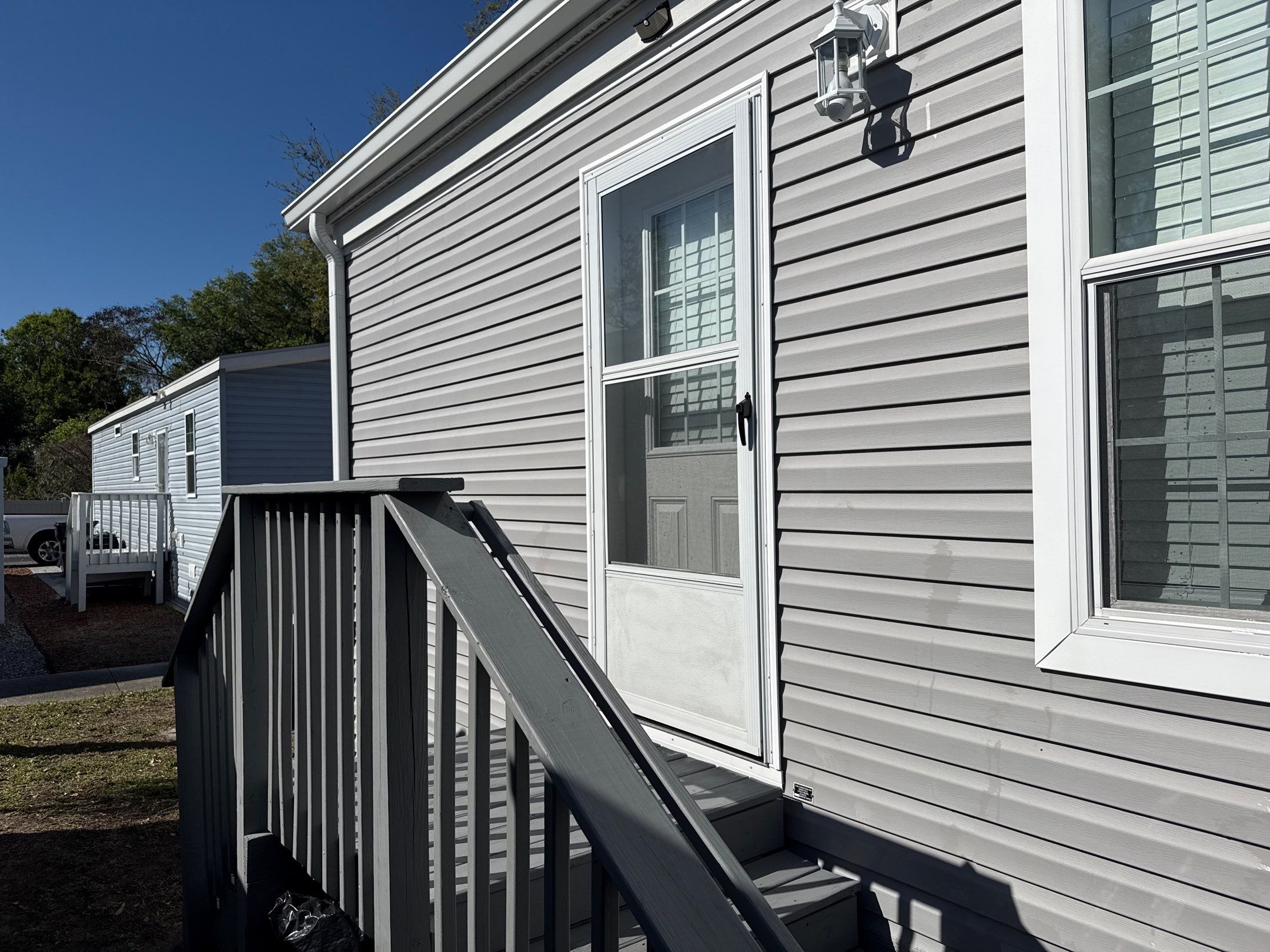 On-the-Spot Mobile Home House Wash in Terra Ceia, FL | Fisherman’s Cove RV Resort by Sunshine AquaWash
