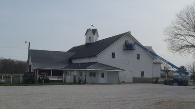 New metal roof on heirloom barn by Dagny Builders