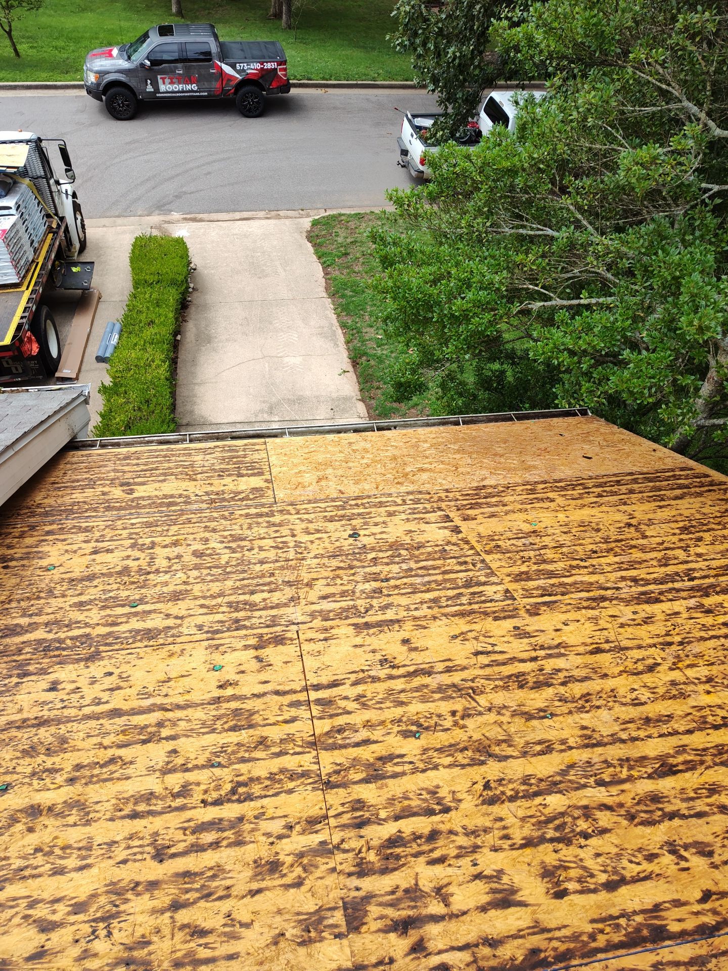 Residential Roof + Gutters & Downspouts & Gutter Guards  by Titan Commercial & Residential Roofing 