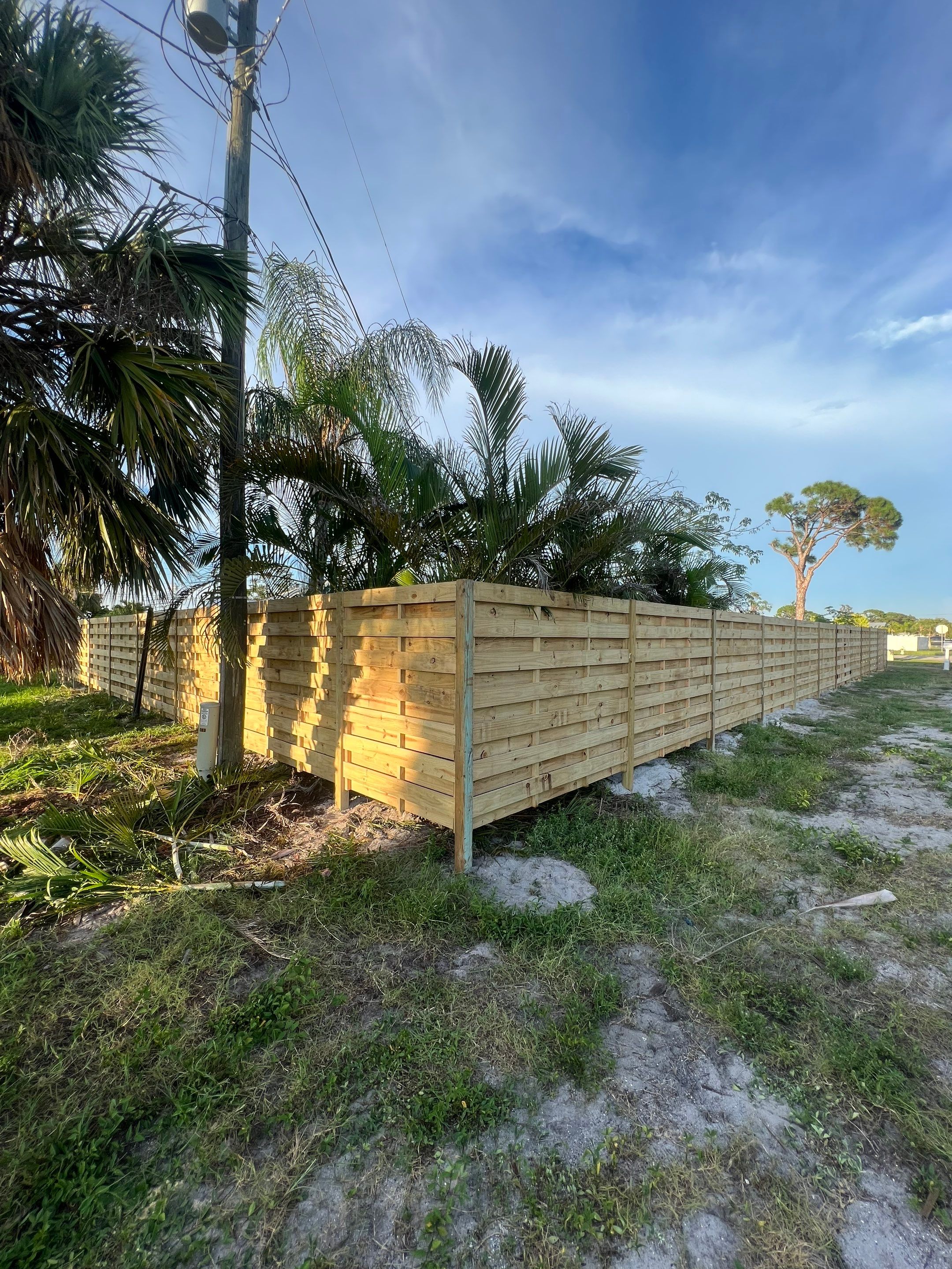 Wood Fence Installation using Horizontal Shadowbox Wood Privacy Fence by Asap fence and gates, LLC