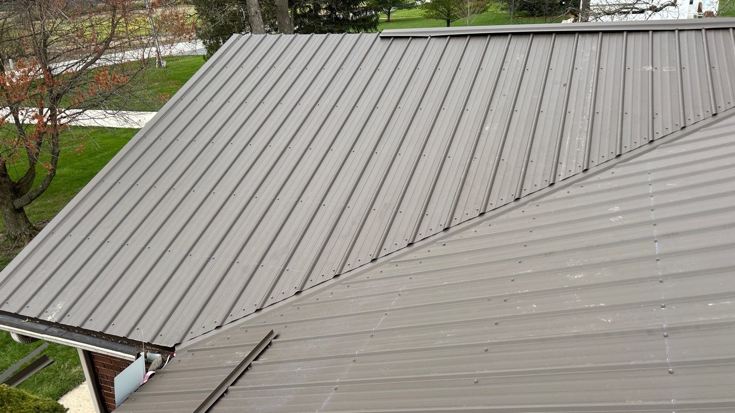 Residential Roofing Installation using Performance Panel Metal - Crinkle Bronze by RoofX 