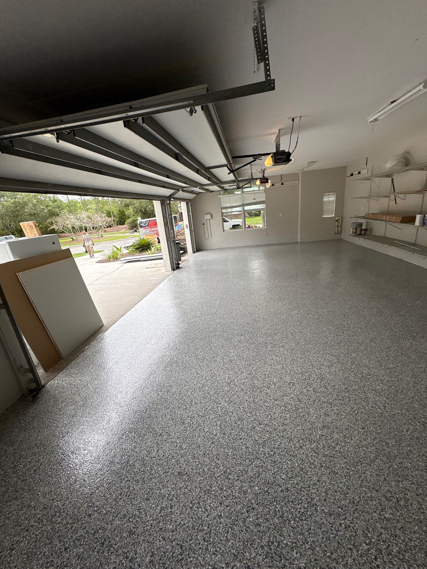 Tampa 2-Car Garage Transformation by Performance Floors & Coating