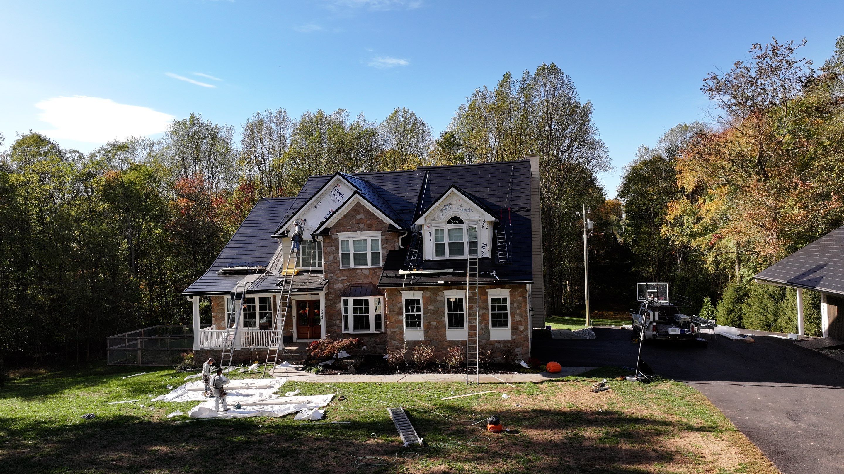 Beautiful James Hardie Siding & Tesla Solar Roof by American Home Contractors