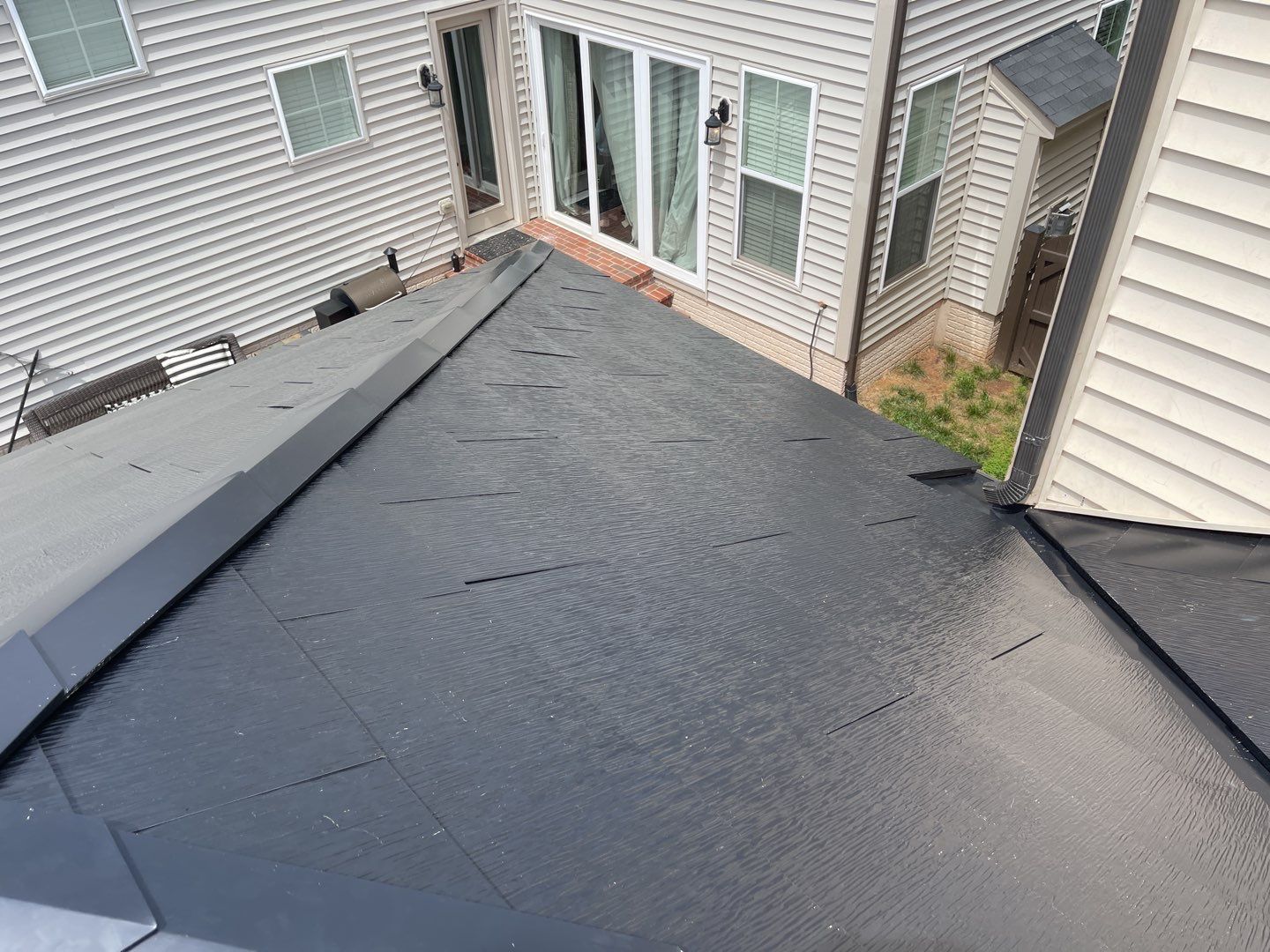 Tesla Solar Roof using Tesla Solar Roof V3 tiles by American Home Contractors