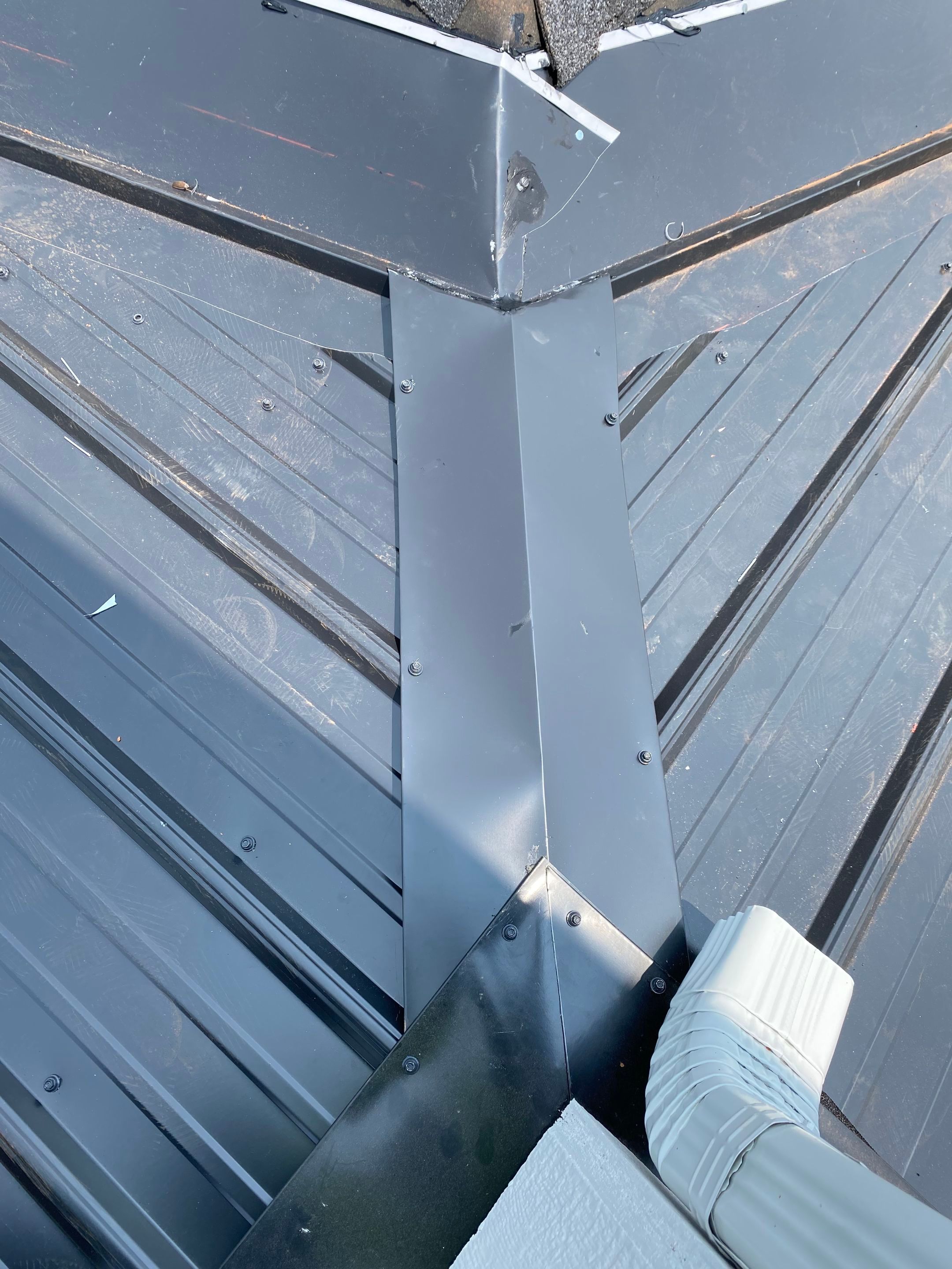 Jason's metal porch roof by BROCK BUILDERS 
