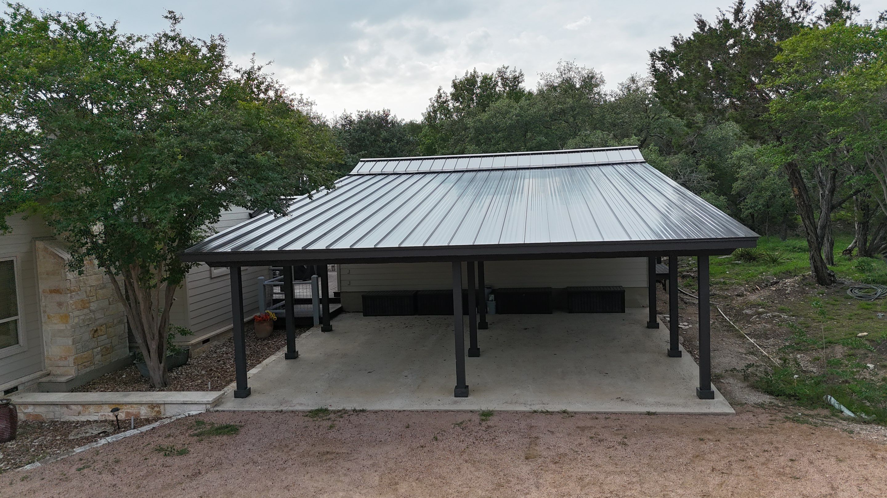 Dark Bronze Fully Striated panel by Wimberley Roofing