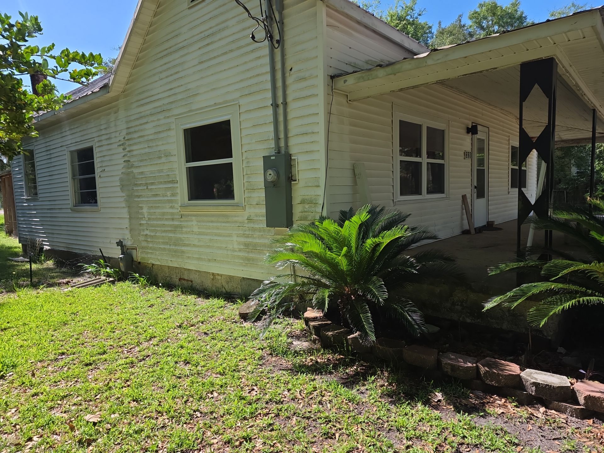 White Vinyl Window Replacement for Residential Home in Williston by Windows & Doors Store