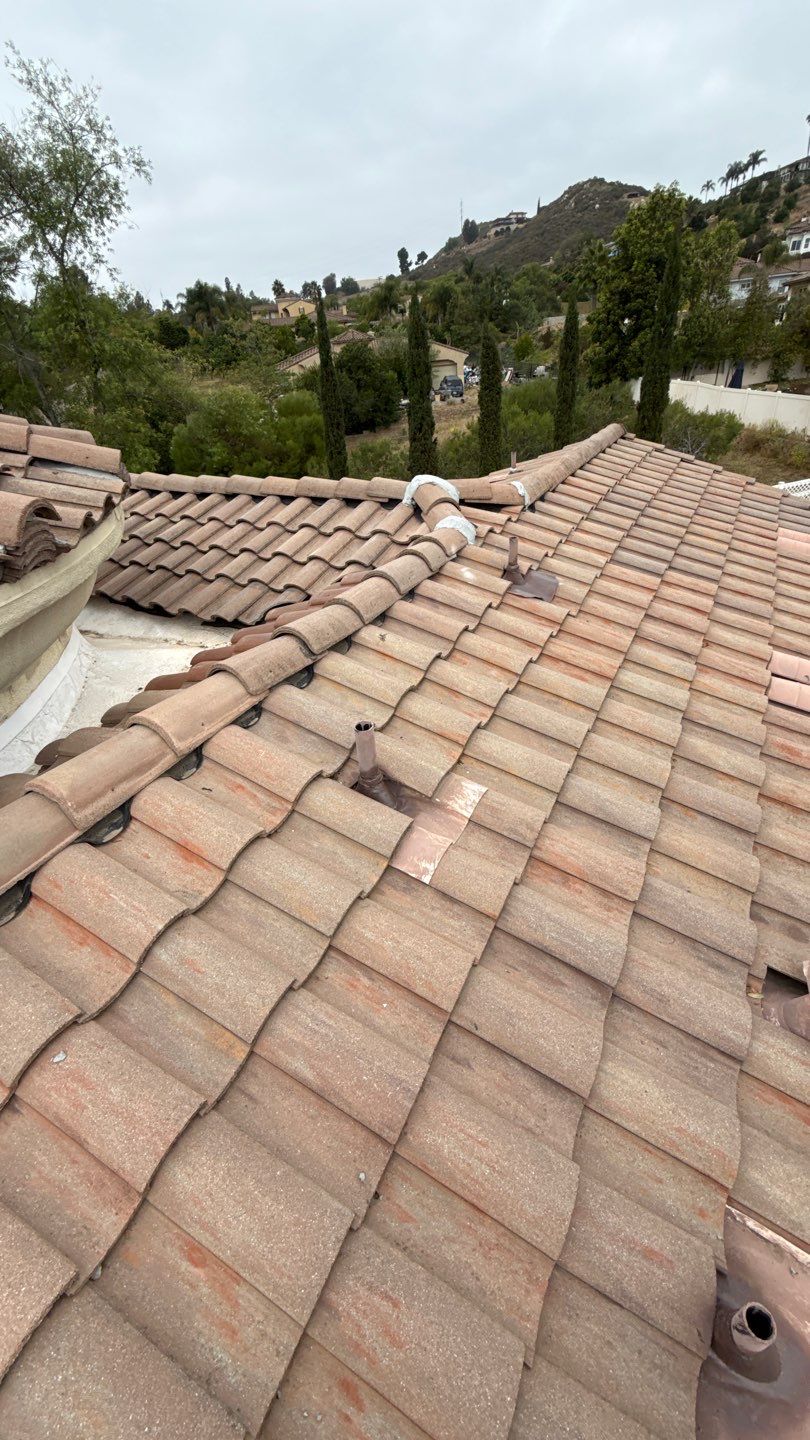 Terracotta Tile Roof Repair and Ridge Cap Sealing in Escondido by Reliable Roofing San Diego Inc.