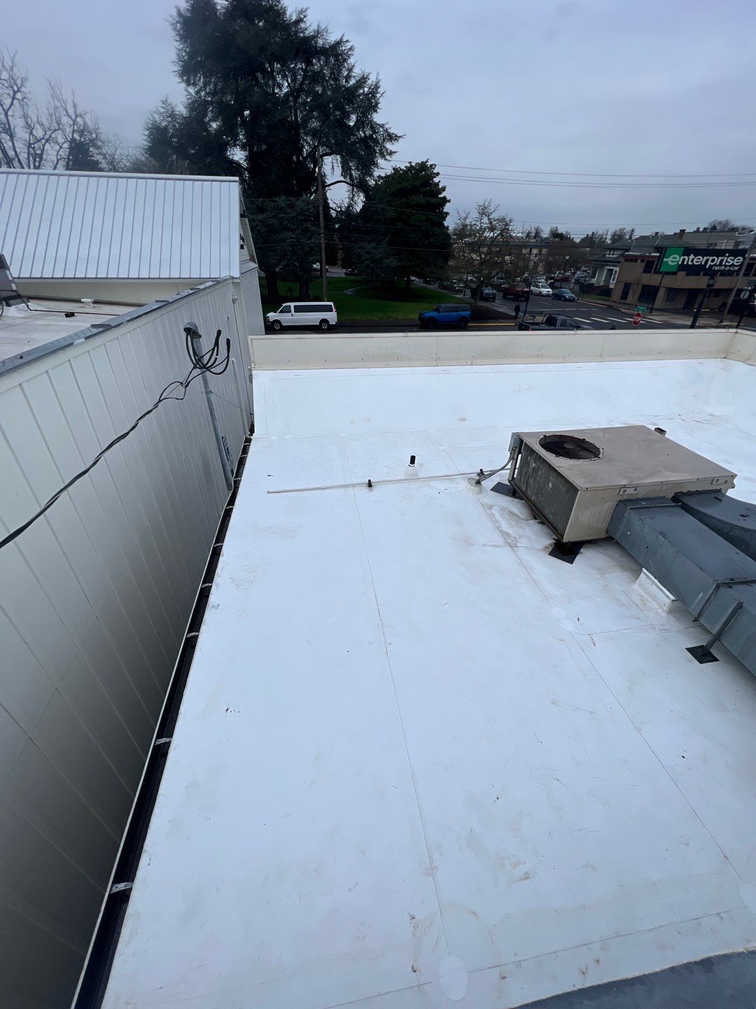 Commercial Flat Roof Installation using GAF 60Mil TPO  by Orezona Building & Roofing Company, Inc.