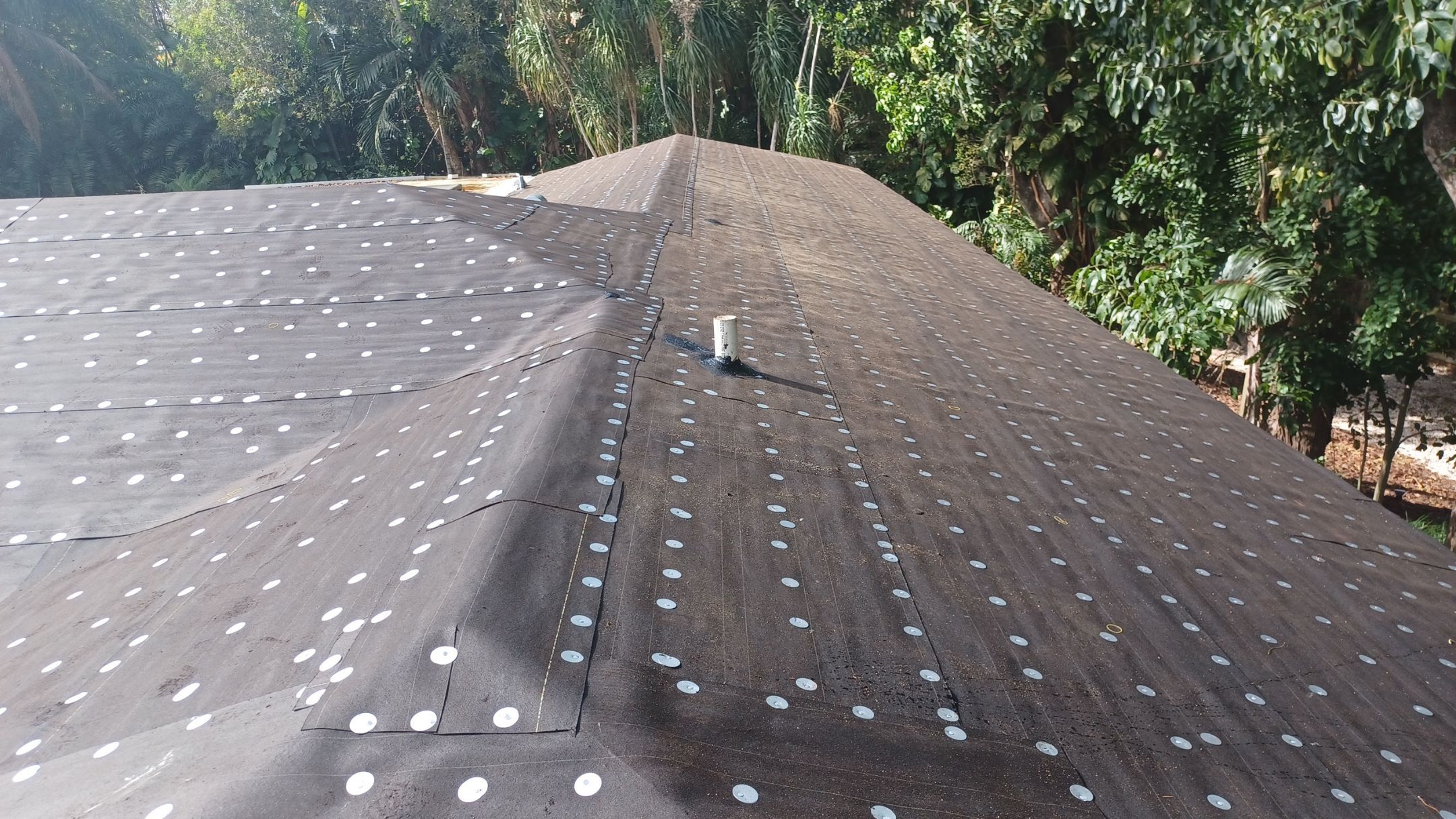 Residential Roofing Installation using 1" Nail strip metal roof by BLUES BROTHERS ROOFING
