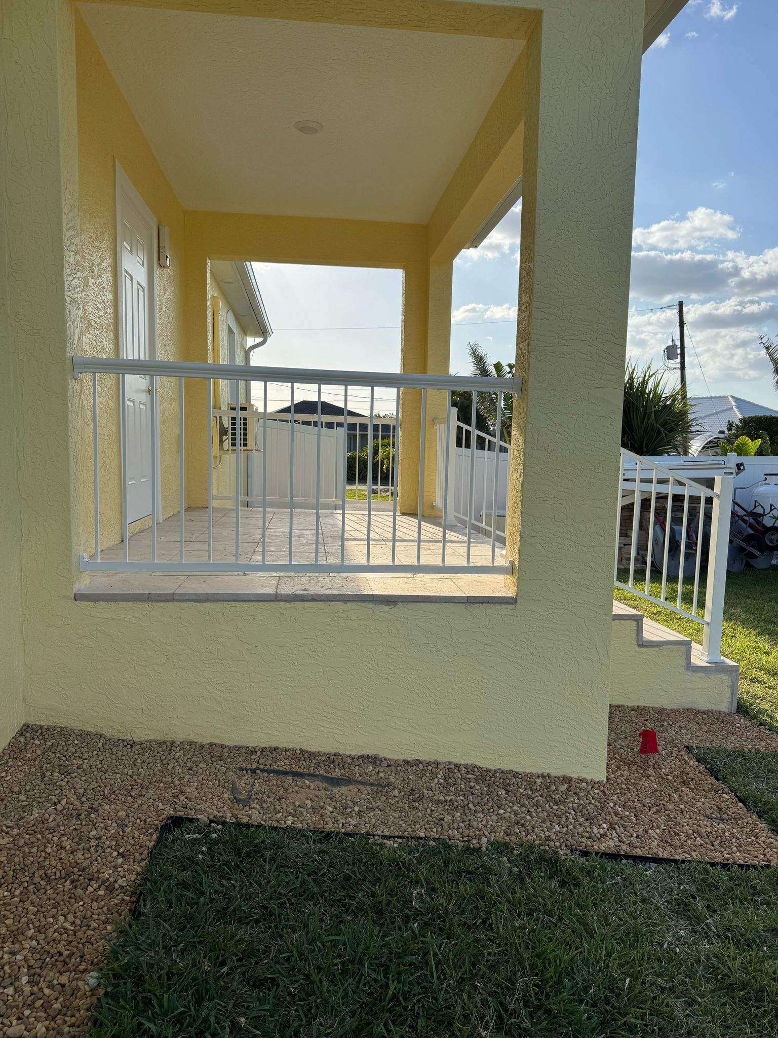 Vinyl Privacy Fence and Porch Railing Installation in Port Charlotte by True Fence LLC