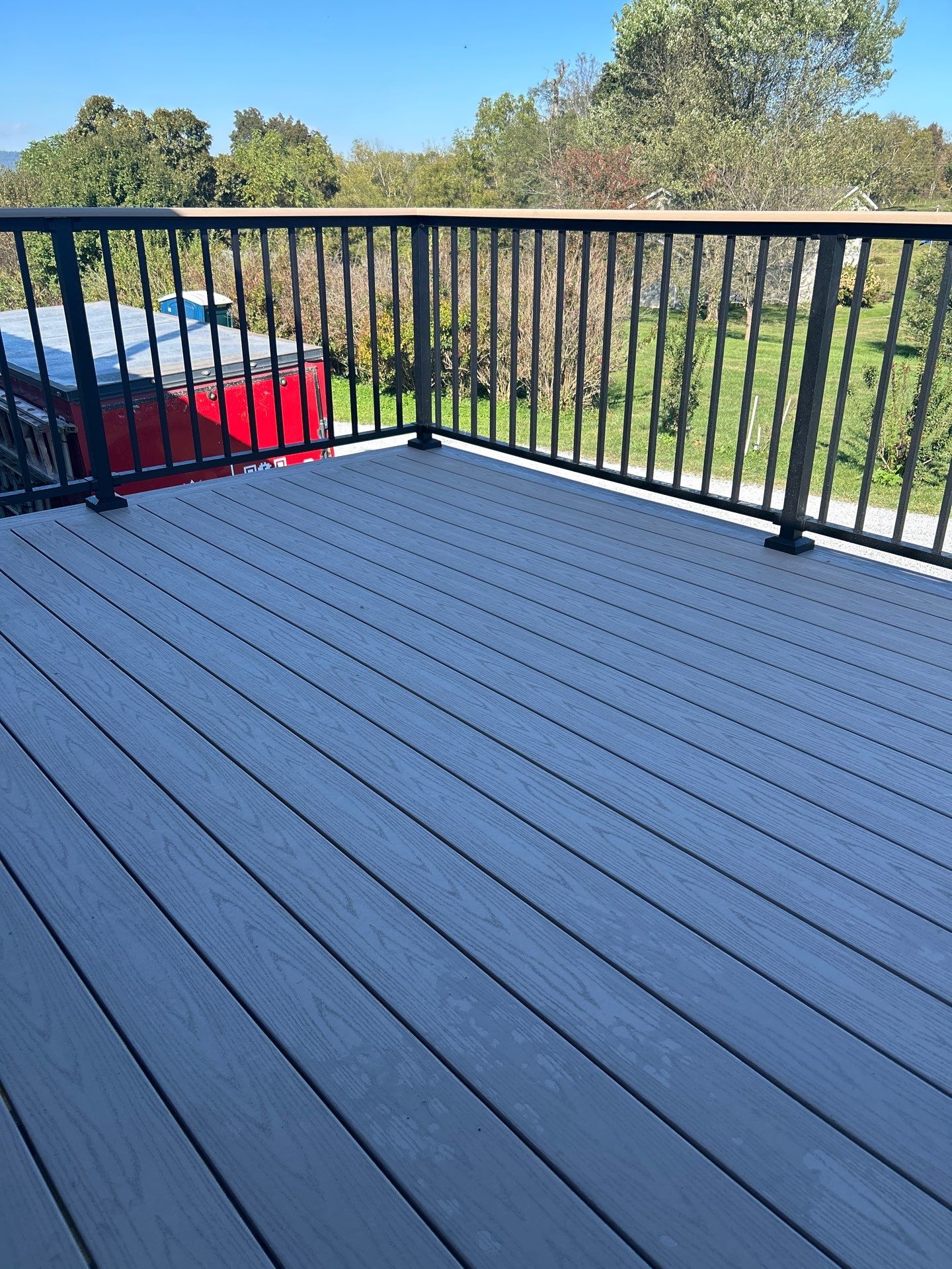 Elevated Composite Deck in Ronceverte by Walnut Hollow Decks & Outdoor Living