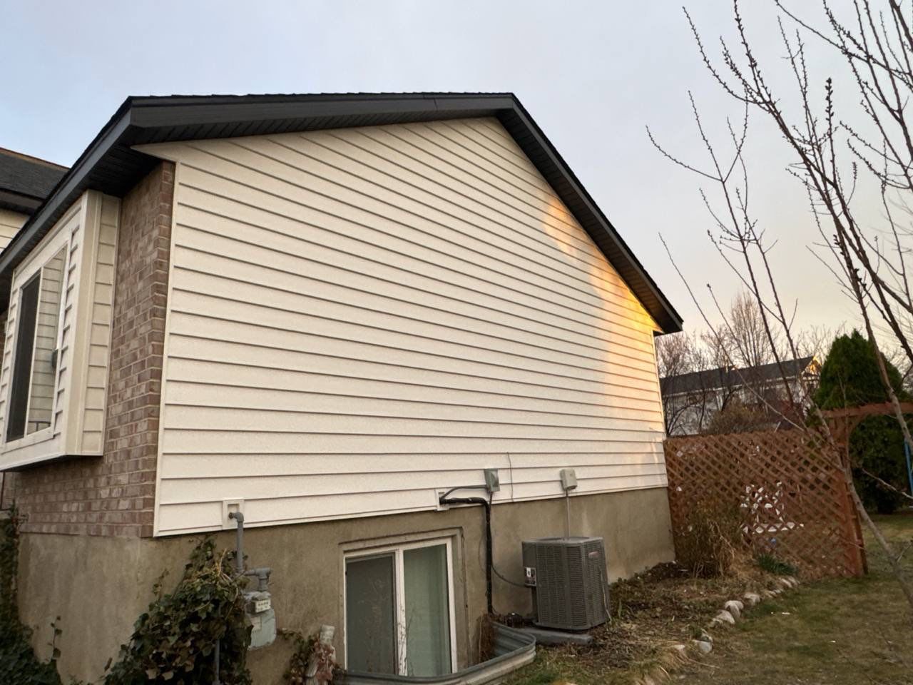 Salt Lake City | Premium Insulated Vinyl & Mixed Materials | Crisp White & Black by Ideal Siding Utah