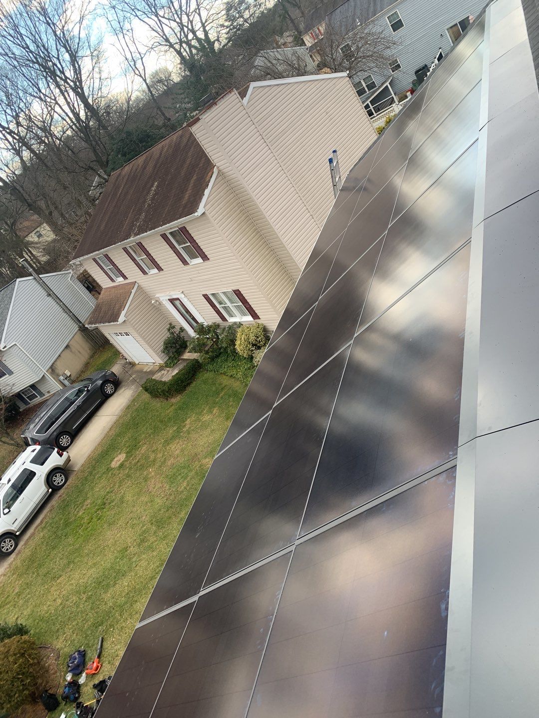Roof Replacement with GAF Decotech integrated solar panels by American Home Contractors